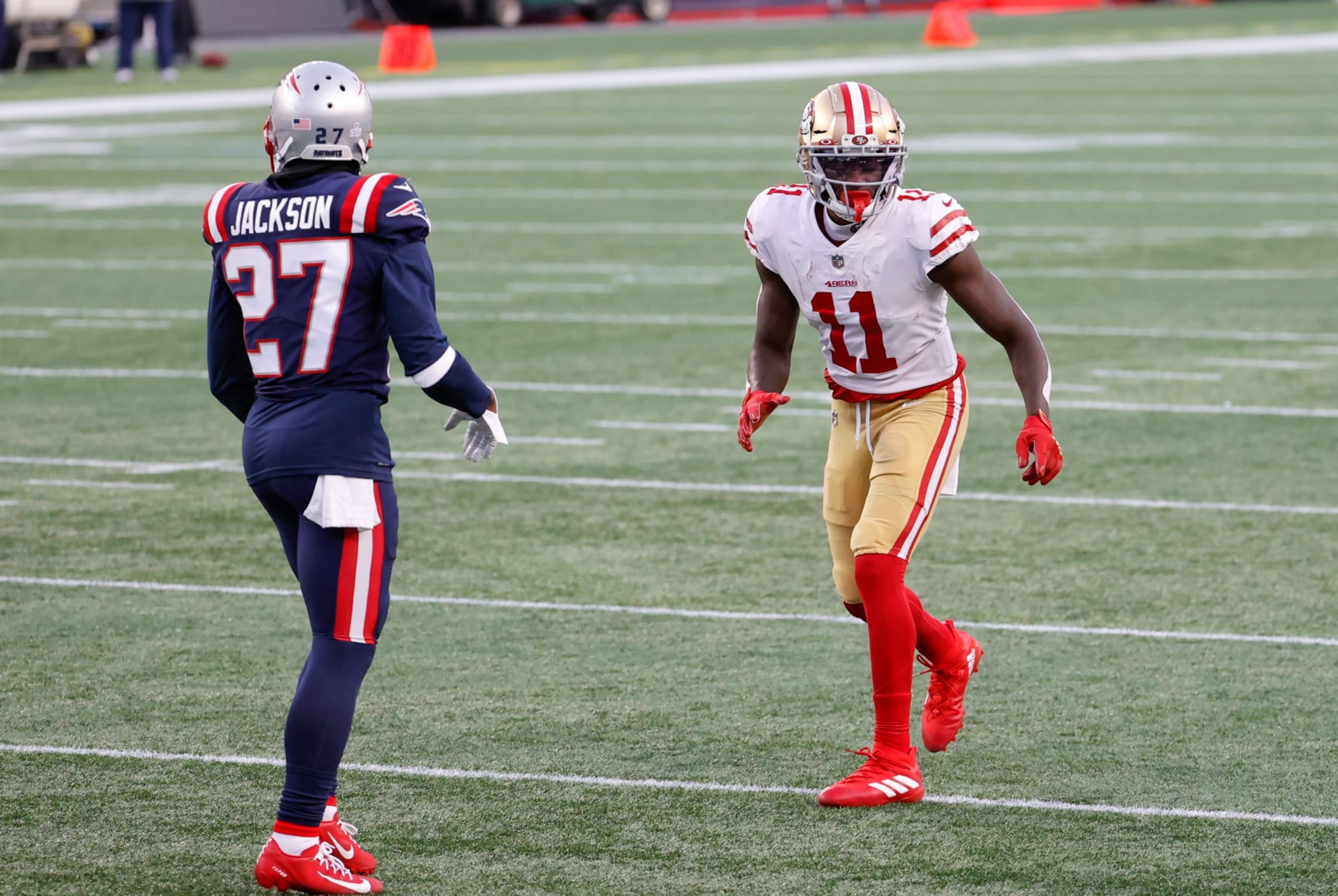 FOXBOROUGH, MA - OCTOBER 25: San Francisco 49ers wide receiver Brandon Aiyuk (11) lines up on New England Patriots defensive back J.C. Jackson (27) during a game between the New England Patriots and the San Francisco 49ers on October 25, 2020, at Gillette Stadium in Foxborough, Massachusetts. (Photo by Fred Kfoury III/Icon Sportswire via Getty Images) FOXBOROUGH, MA - OCTOBER 25: San Francisco 49ers wide receiver Brandon Aiyuk (11) lines up on New England Patriots defensive back J.C. Jackson (27) during a game between the New England Patriots and the San Francisco 49ers on October 25, 2020, at Gillette Stadium in Foxborough, Massachusetts. (Photo by Fred Kfoury III/Icon Sportswire via Getty Images)