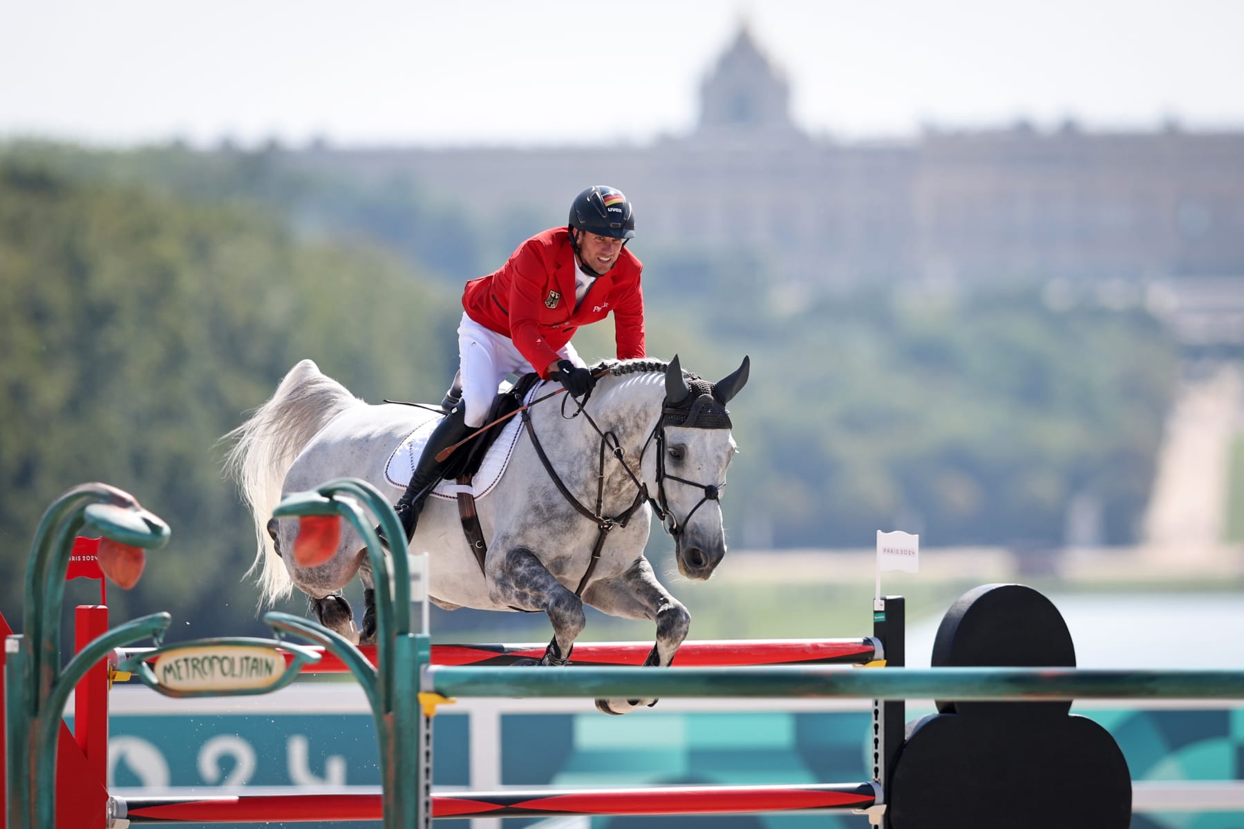 VERSAILLES, FRANCE - AUGUST 06: Christian Kukuk and horse Checker 47 of Team Germany compete in the Jumping Individual Final on day eleven of the Olympic Games Paris 2024 at Chateau de Versailles on August 06, 2024 in Versailles, France. (Photo by Stefan Matzke - sampics/Getty Images)