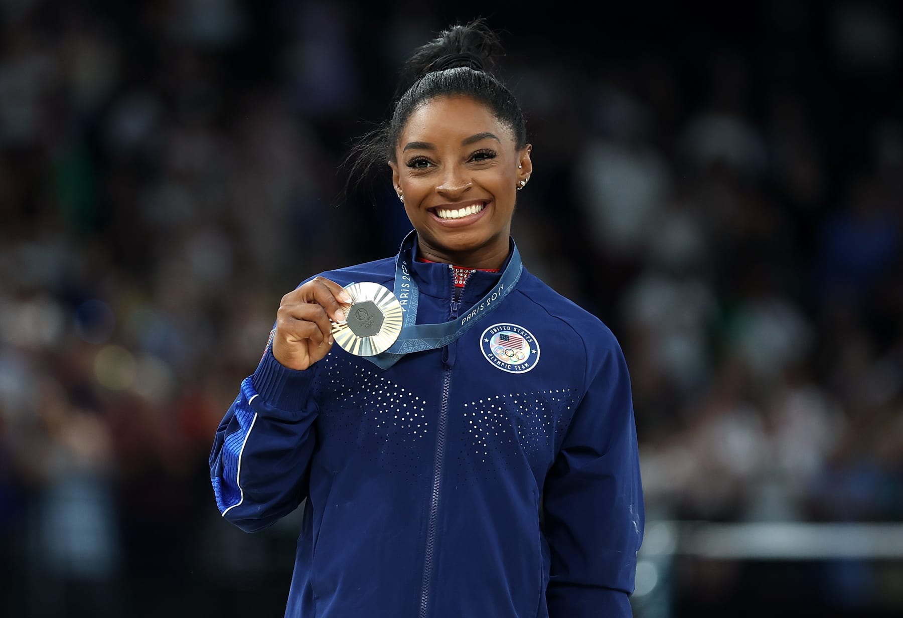 Silver medalist Simone Biles of the United States poses for photos during the victory ceremony of women's floor exercise of artistic gymnastics at the Paris 2024 Olympic Games in Paris, France, Aug. 5, 2024. (Photo by Cao Can/Xinhua via Getty Images)