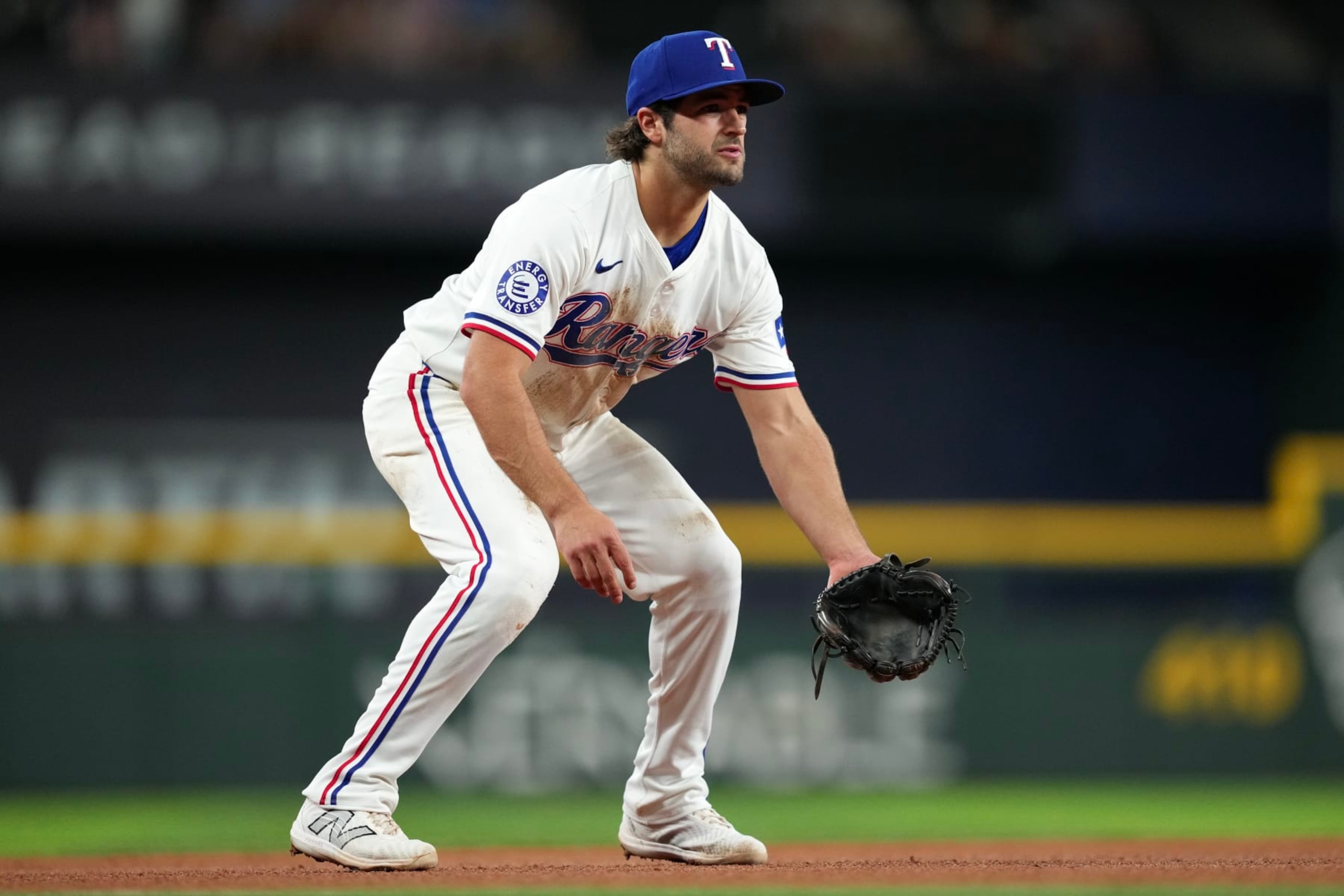 ARLINGTON, TEXAS - JULY 23: Josh Smith #8 of the Texas Rangers watches play during the seventh inning against the Chicago White Sox at Globe Life Field on July 23, 2024 in Arlington, Texas. (Photo by Sam Hodde/Getty Images)