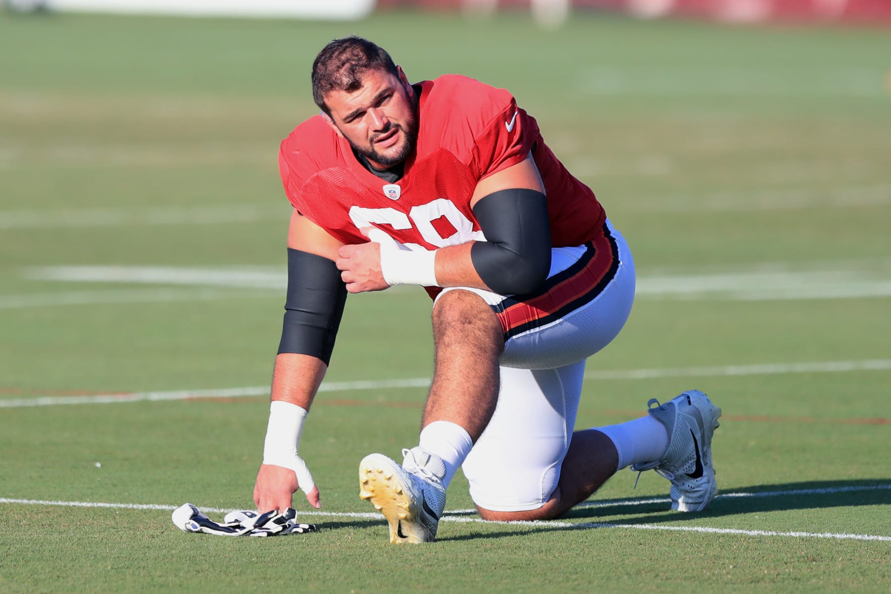 TAMPA, FL - AUG 02: Tampa Bay Buccaneers Offensive Lineman Ben Bredeson (68) stretches during Training Camp on August 02, 2024 at the AdventHealth Training Center at One Buccaneer Place in Tampa, Florida. (Photo by Cliff Welch/Icon Sportswire via Getty Images)