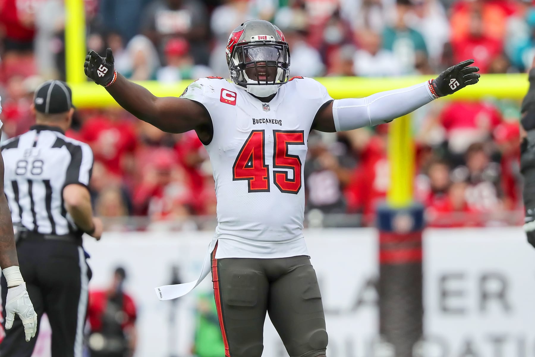 TAMPA, FL - JANUARY 16: Tampa Bay Buccaneers Linebacker Devin White (45) celebrates a defensive stop during the NFL Wild Card game between the Philadelphia Eagles and the Tampa Bay Buccaneers on January 16, 2022 at Raymond James Stadium in Tampa, Florida. (Photo by Cliff Welch/Icon Sportswire via Getty Images)