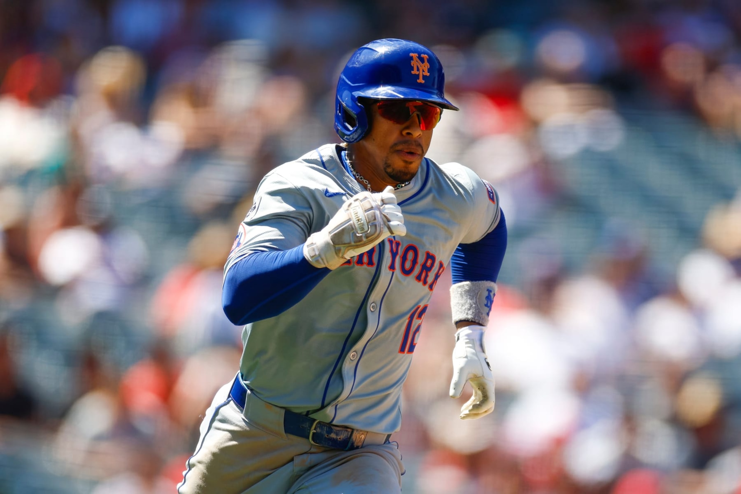 ANAHEIM, CALIFORNIA - AUGUST 4: Francisco Lindor #12 of the New York Mets runs up the line on an RBI single in the fifth inning during a game against the Los Angeles Angels at Angel Stadium of Anaheim on August 4, 2024 in Anaheim, California. (Photo by Brandon Sloter/Getty Images)