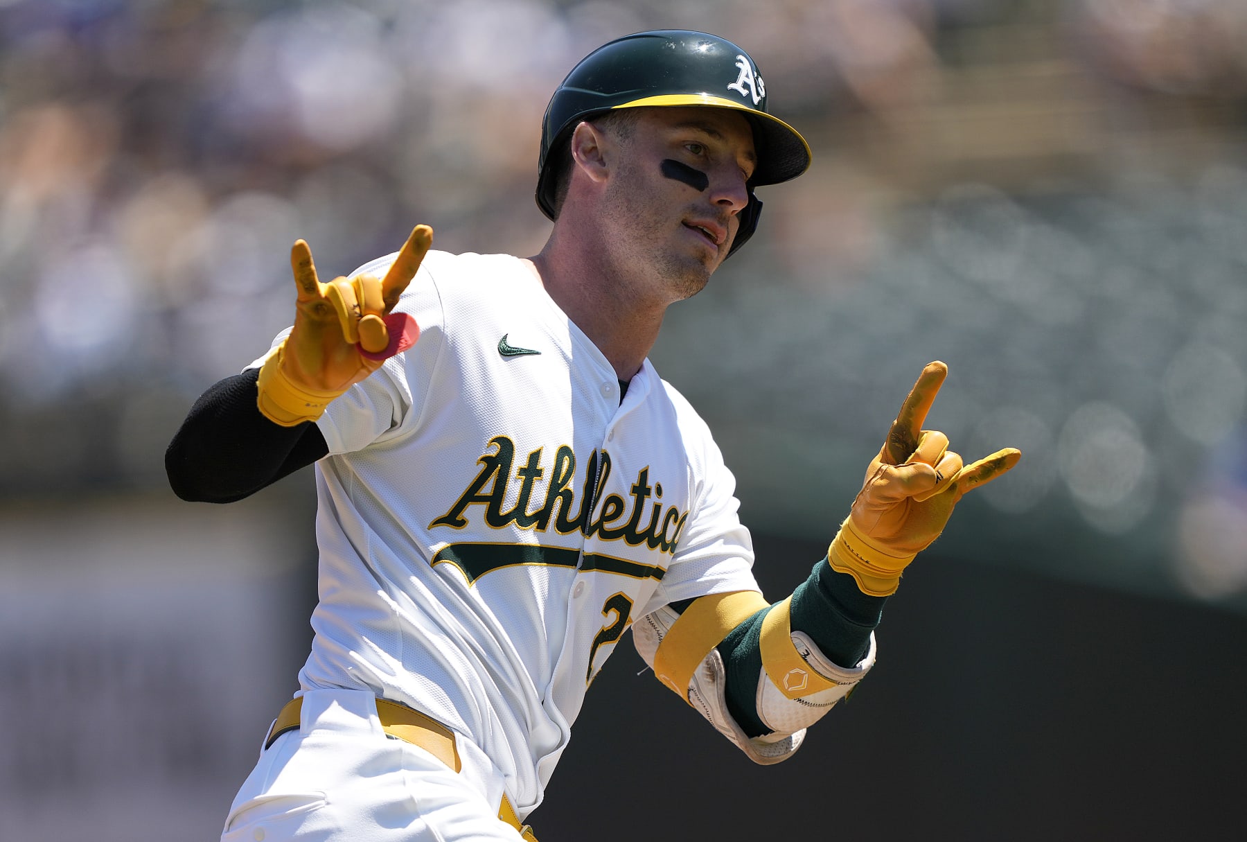 OAKLAND, CALIFORNIA - AUGUST 04:  Brent Rooker #25 of the Oakland Athletics trotting around the bases celebrates after hitting a two-run home run against the Los Angeles Dodgers in the bottom of the first inning at the Oakland Coliseum on August 4, 2024 in Oakland, California. (Photo by Thearon W. Henderson/Getty Images)