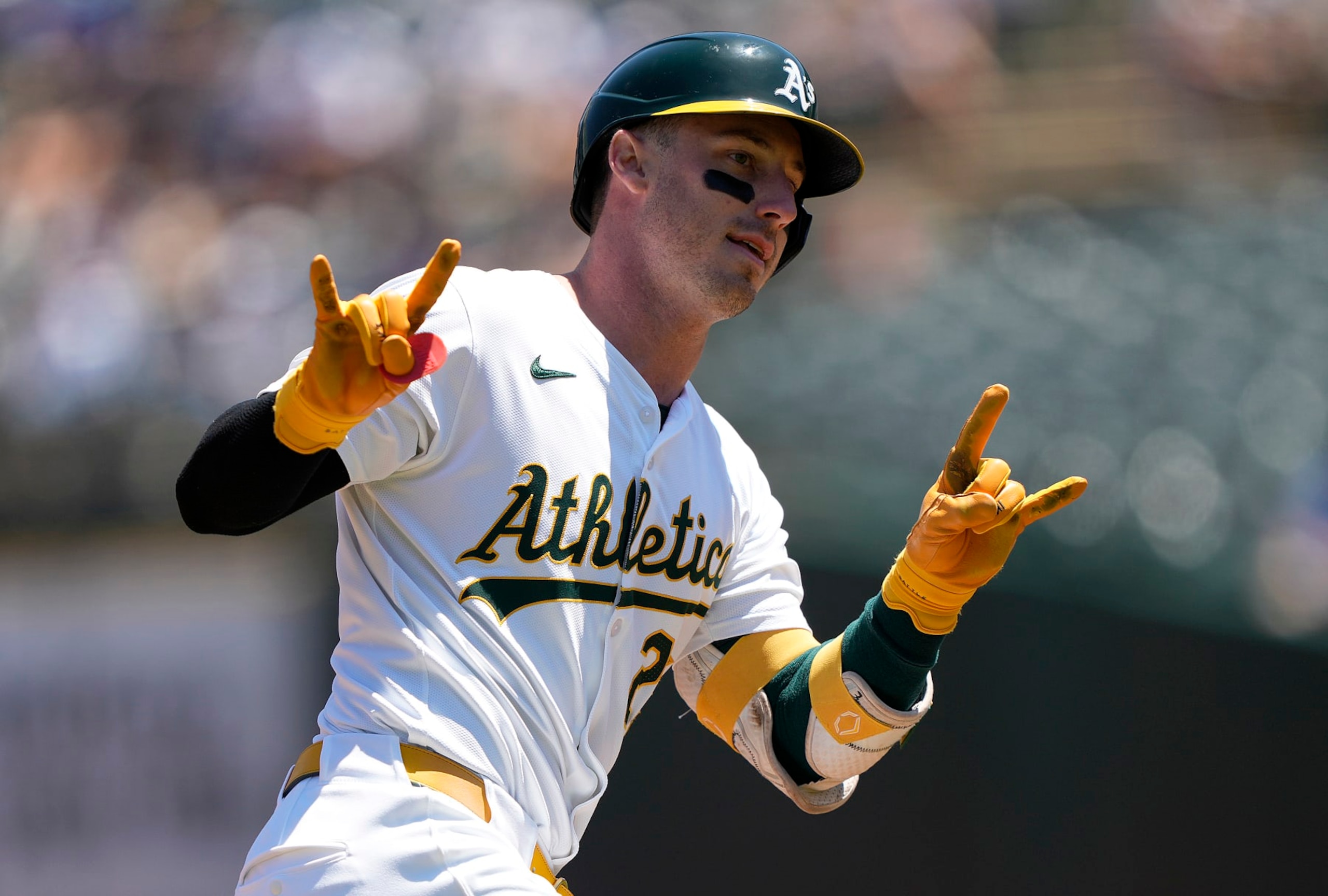 OAKLAND, CALIFORNIA - AUGUST 04:  Brent Rooker #25 of the Oakland Athletics trotting around the bases celebrates after hitting a two-run home run against the Los Angeles Dodgers in the bottom of the first inning at the Oakland Coliseum on August 4, 2024 in Oakland, California. (Photo by Thearon W. Henderson/Getty Images)