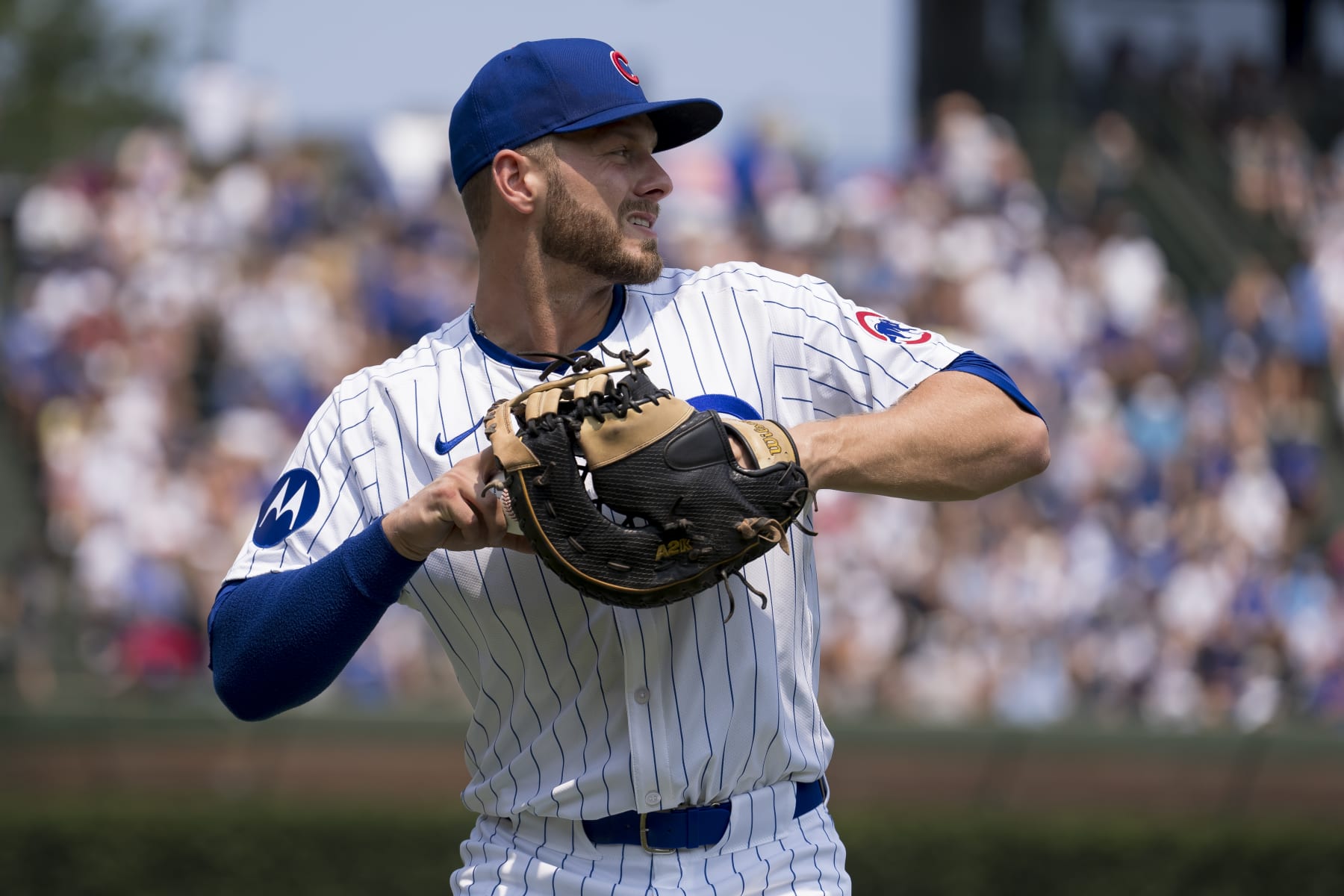 CHICAGO, ILLINOIS - AUGUST 03: Michael Busch of the Chicago Cubs warms up before a game against the St. Louis Cardinals at Wrigley Field on August 03, 2024 in Chicago, Illinois. (Photo by Matt Dirksen/Chicago Cubs/Getty Images)