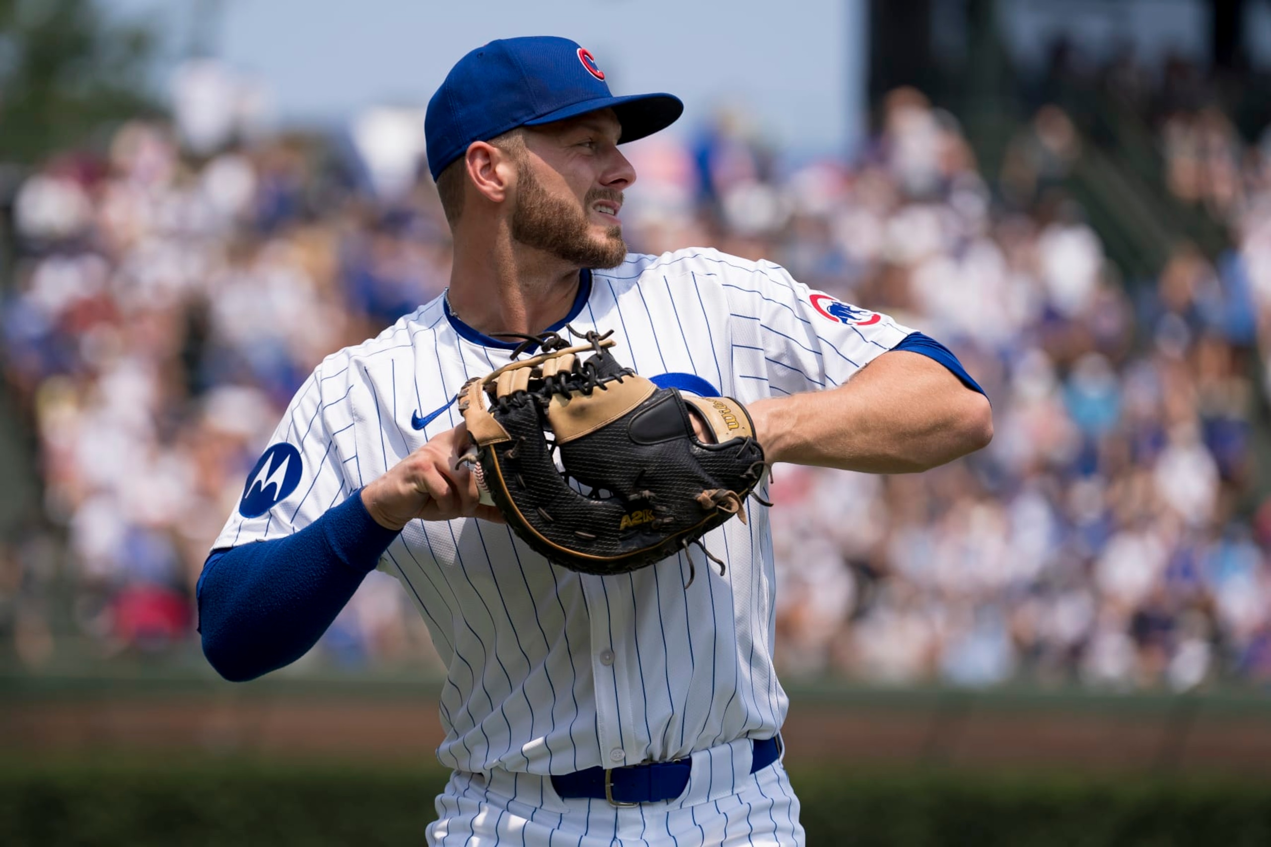 CHICAGO, ILLINOIS - AUGUST 03: Michael Busch of the Chicago Cubs warms up before a game against the St. Louis Cardinals at Wrigley Field on August 03, 2024 in Chicago, Illinois. (Photo by Matt Dirksen/Chicago Cubs/Getty Images)