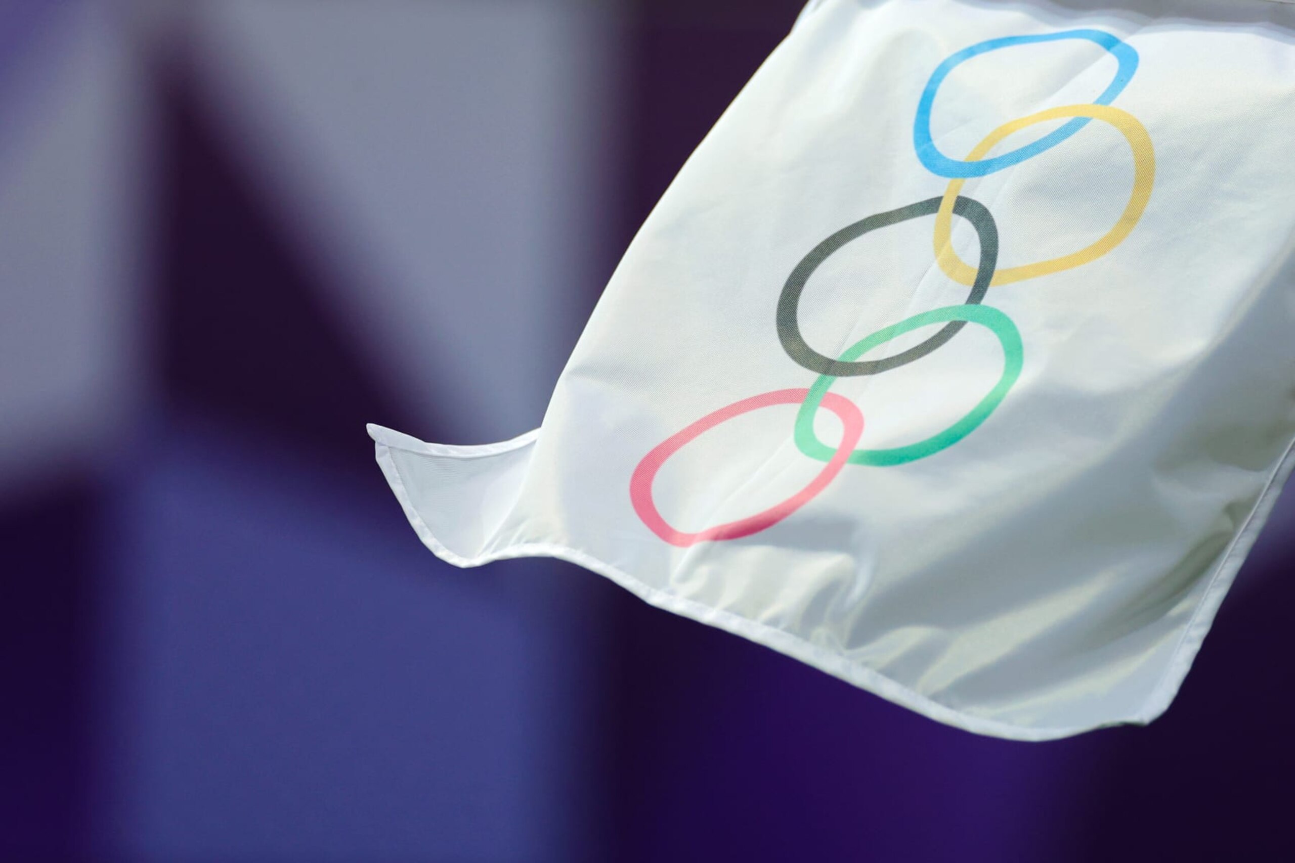 NICE, FRANCE - JULY 25: The Olympic rings are seen on a corner flag during the Women's group B match between United States and Zambia during the Olympic Games Paris 2024 at Stade de Nice on July 25, 2024 in Nice, France. (Photo by Marc Atkins/Getty Images)