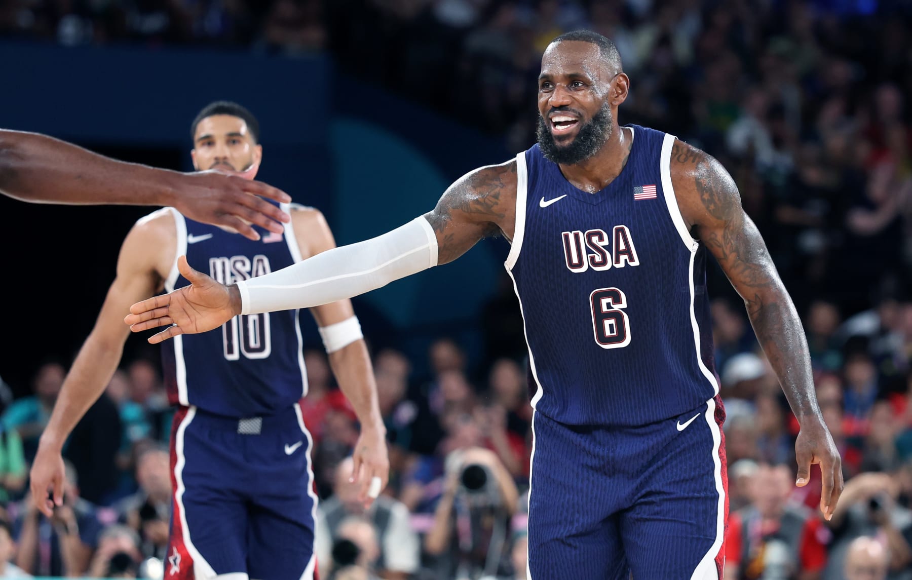 PARIS, FRANCE August 6, 2024-USA's LeBron James celebrates against Brazil in the quarterfinals at the 2024 Paris Olympics Tuesday. (Skalij/Los Angeles Times via Getty Images)