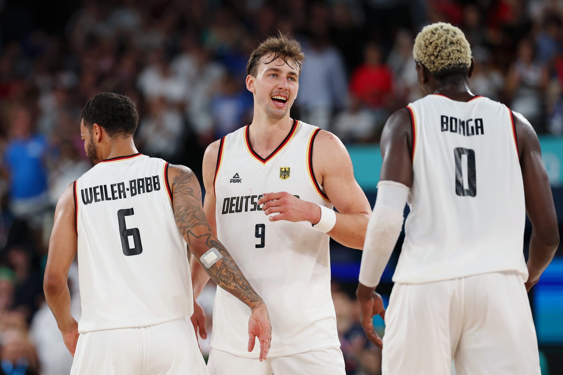 PARIS, FRANCE - AUGUST 06: Franz Wagner #9 of Team Germany celebrates during the Men's Quarterfinal match between Team Germany and Team Greece on day eleven of the Olympic Games Paris 2024 at Bercy Arena on August 06, 2024 in Paris, France. (Photo by Jamie Squire/Getty Images)