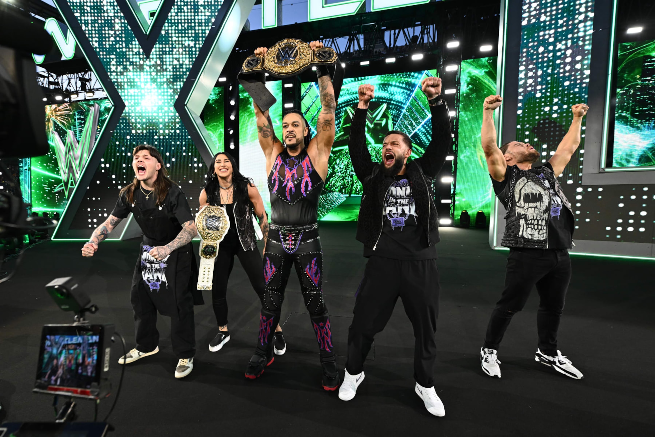 PHILADELPHIA, PENNSYLVANIA - APRIL 07: Damian Priest(C) celebrates his WWE World Championship win with Dominik Mysterio, Rhea Ripley, Finn Balor and JD McDonagh, the Judgment Day during Night Two of WrestleMania 40 at Lincoln Financial Field on April 7, 2024 in Philadelphia, Pennsylvania. (Photo by WWE/Getty Images)
