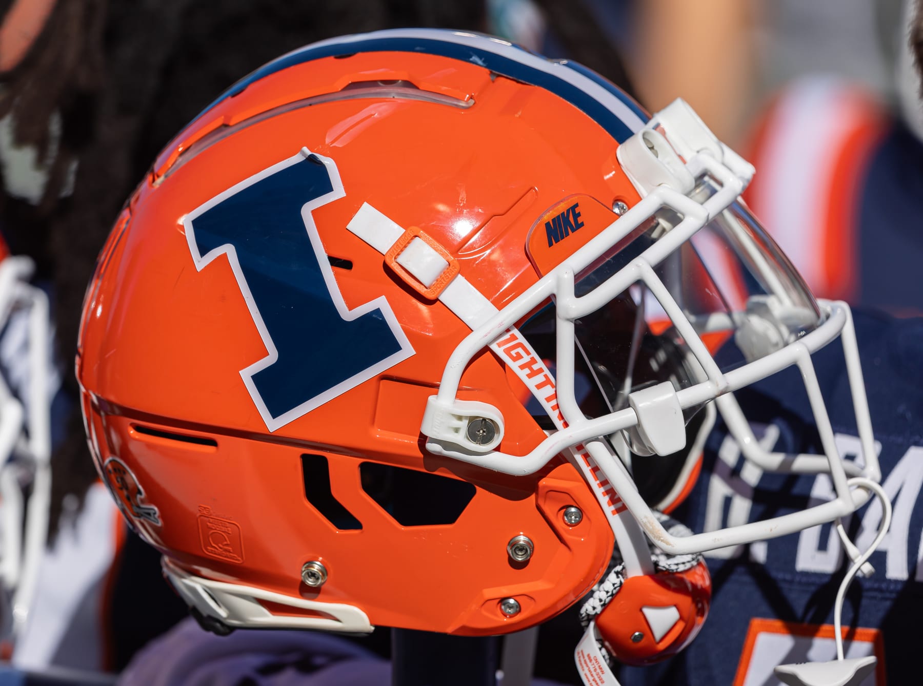 CHAMPAIGN, ILLINOIS - OCTOBER 21: A Illinois Fighting Illini helmet is seen on the sidelines during the game against the Wisconsin Badgers at Memorial Stadium on October 21, 2023 in Champaign, Illinois. (Photo by Michael Hickey/Getty Images)