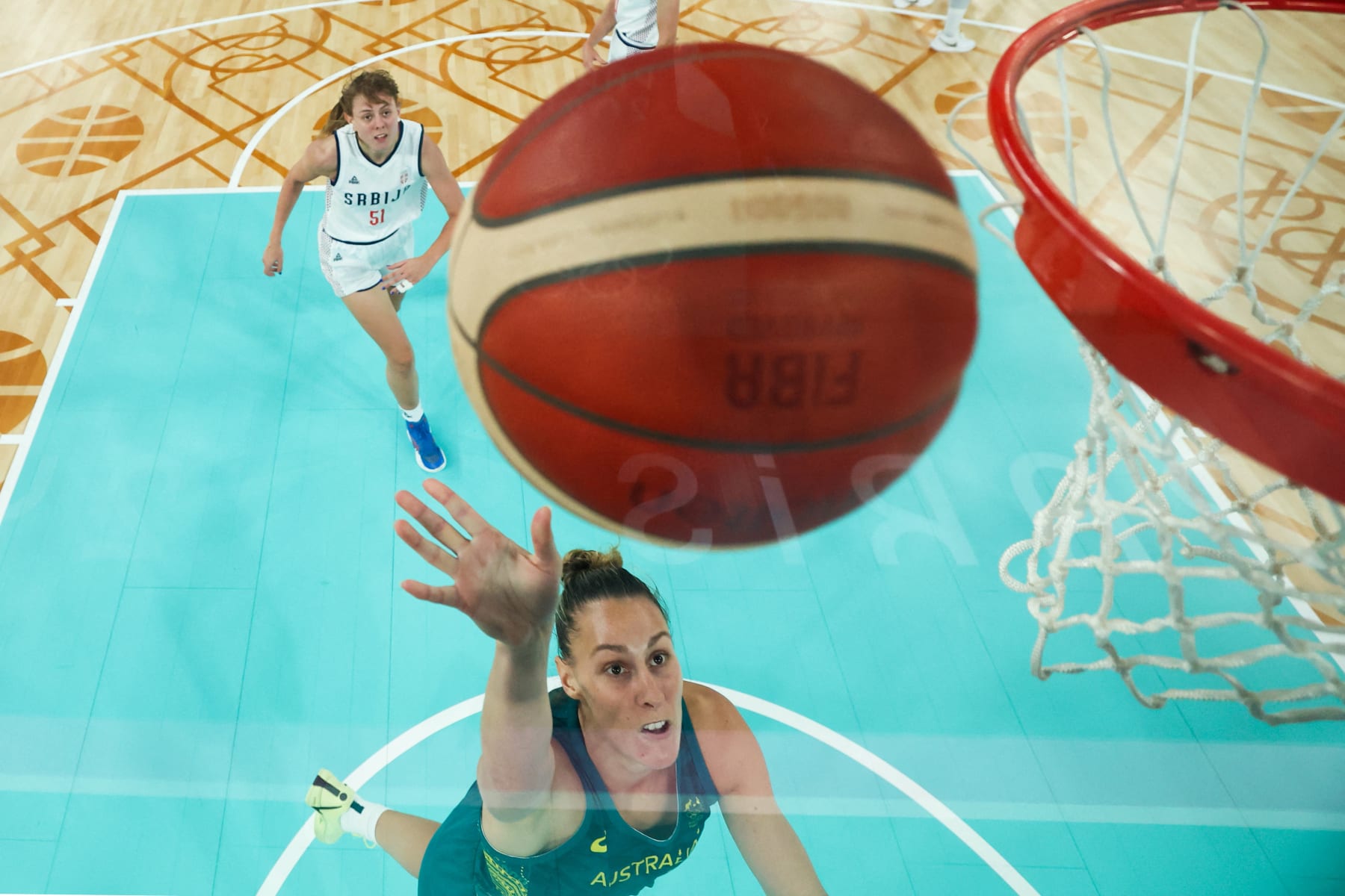 Australia's #06 Steph Talbot goes to the basket in the women's quarterfinal basketball match between Serbia and Australia during the Paris 2024 Olympic Games at the Bercy Arena in Paris on August 7, 2024. (Photo by Gregory SHAMUS / POOL / AFP) (Photo by GREGORY SHAMUS/POOL/AFP via Getty Images)