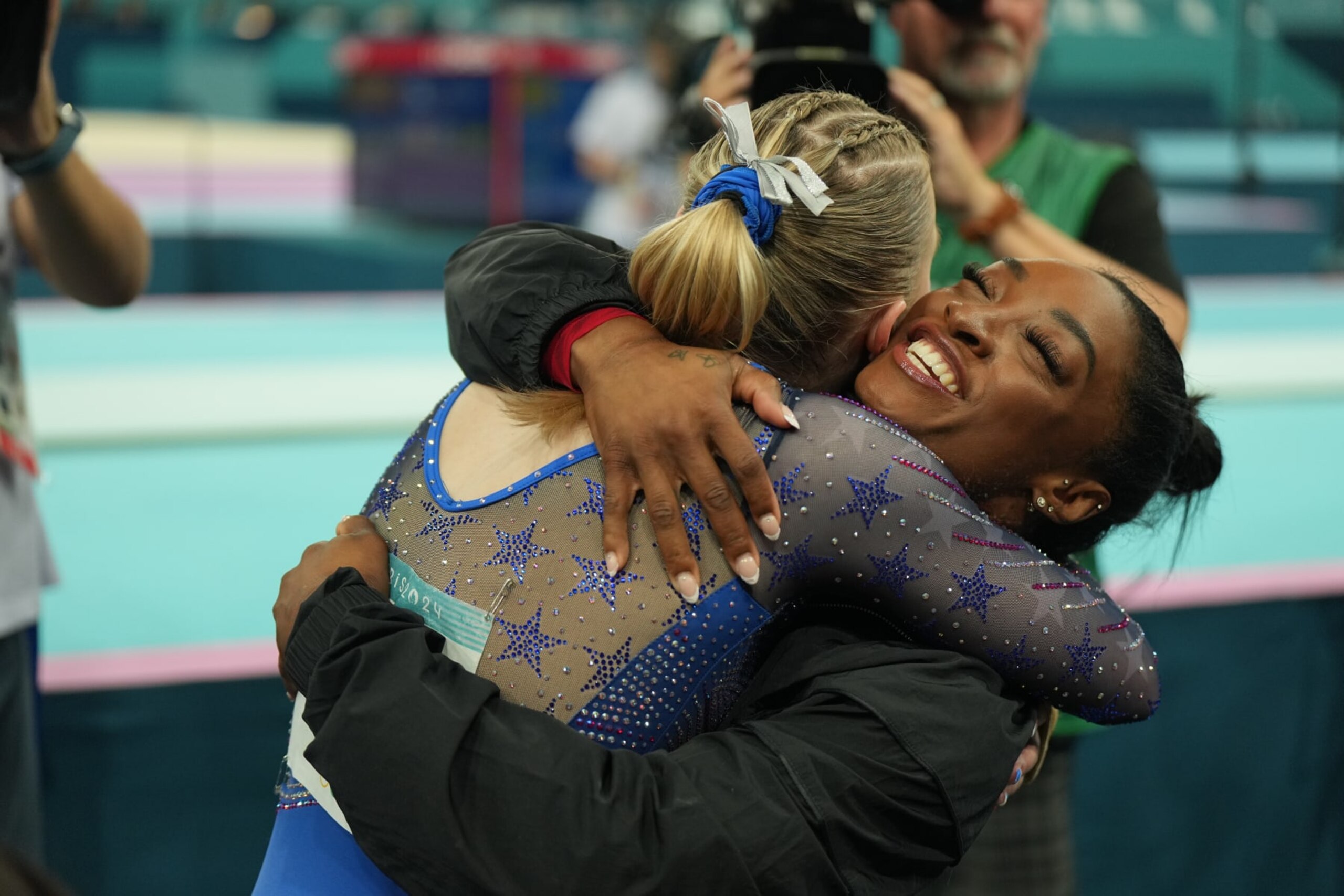 Gymnastics: 2024 Summer Olympics: Team USA Jade Carey and Simone Biles in action, celebrate and hug during the Women's Vault final at Bercy Arena.
Paris, France 8/3/2024
CREDIT: Erick W. Rasco (Photo by Eric W. Rasco/Sports Illustrated via Getty Images)
(Set Number: X164569 TK1) Gymnastics: 2024 Summer Olympics: Team USA Jade Carey and Simone Biles in action, celebrate and hug during the Women's Vault final at Bercy Arena.
Paris, France 8/3/2024
CREDIT: Erick W. Rasco (Photo by Eric W. Rasco/Sports Illustrated via Getty Images)
(Set Number: X164569 TK1)