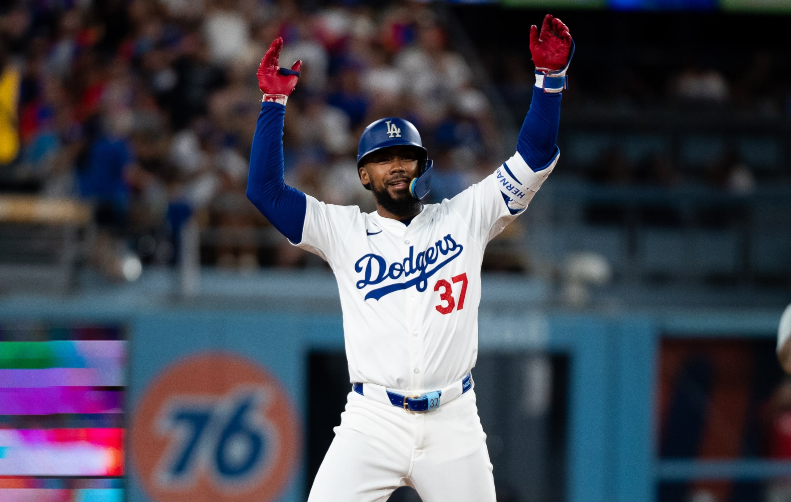 LOS ANGELES, CALIFORNIA - AUGUST 06: Teoscar Hernandez #37 of Los Angeles Dodgers hits a double in the bottom of the sixth inning during the regular season game against the Philadelphia Phillies  at Dodger Stadium on August 06, 2024 in Los Angeles, California. (Photo by Gene Wang/Getty Images)