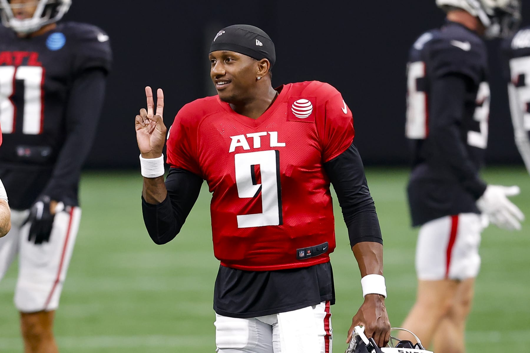 ATLANTA, GEORGIA - AUGUST 2: Michael Penix Jr. #9 of the Atlanta Falcons reacts during NFL training camp at Mercedes-Benz Stadium on August 2, 2024 in Atlanta, Georgia. (Photo by Todd Kirkland/Getty Images)