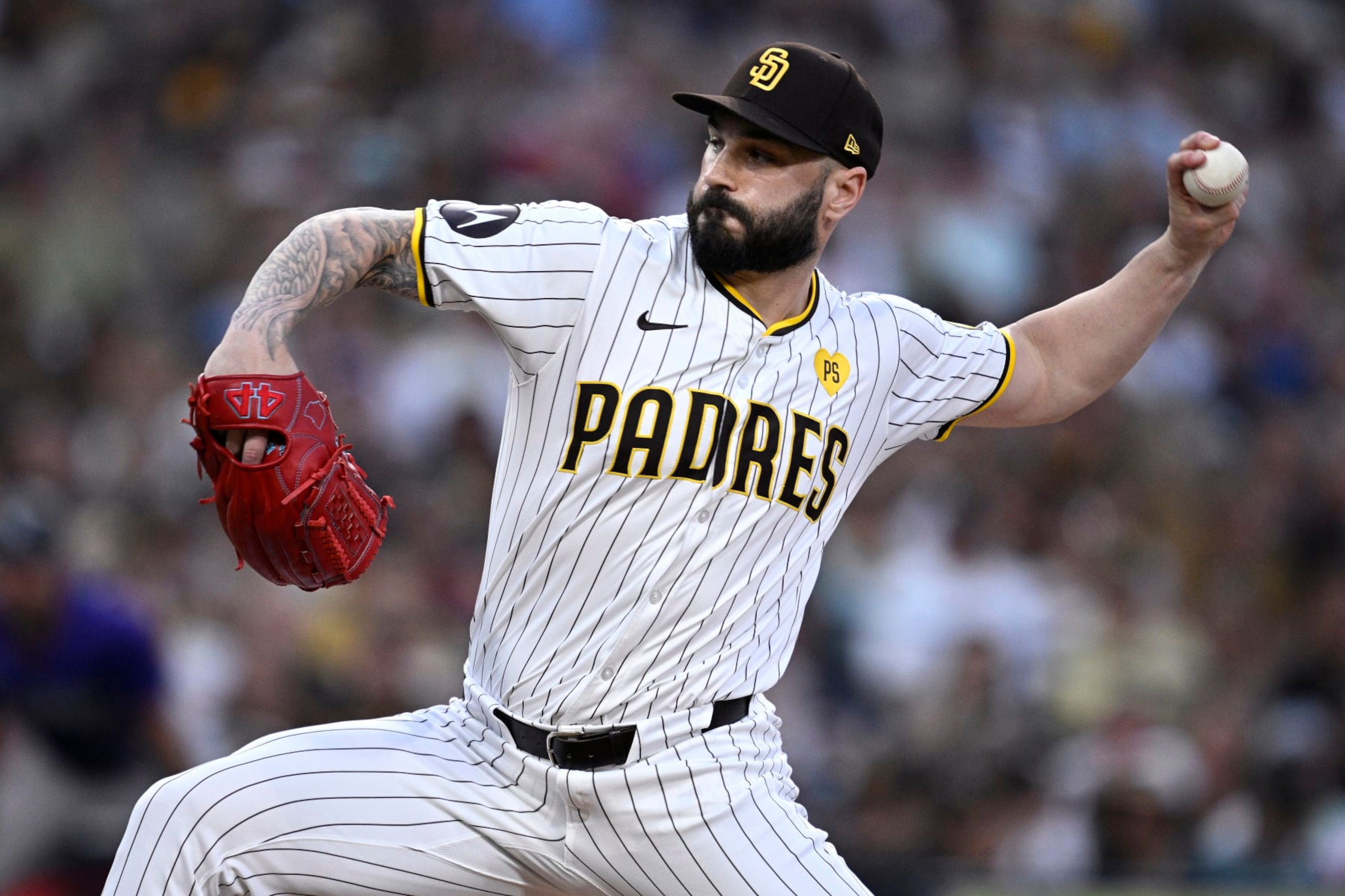 SAN DIEGO, CALIFORNIA - AUGUST 03: Tanner Scott #66 of the San Diego Padres pitches against the Colorado Rockies during the eighth inning at Petco Park on August 03, 2024 in San Diego, California. (Photo by Orlando Ramirez/Getty Images)