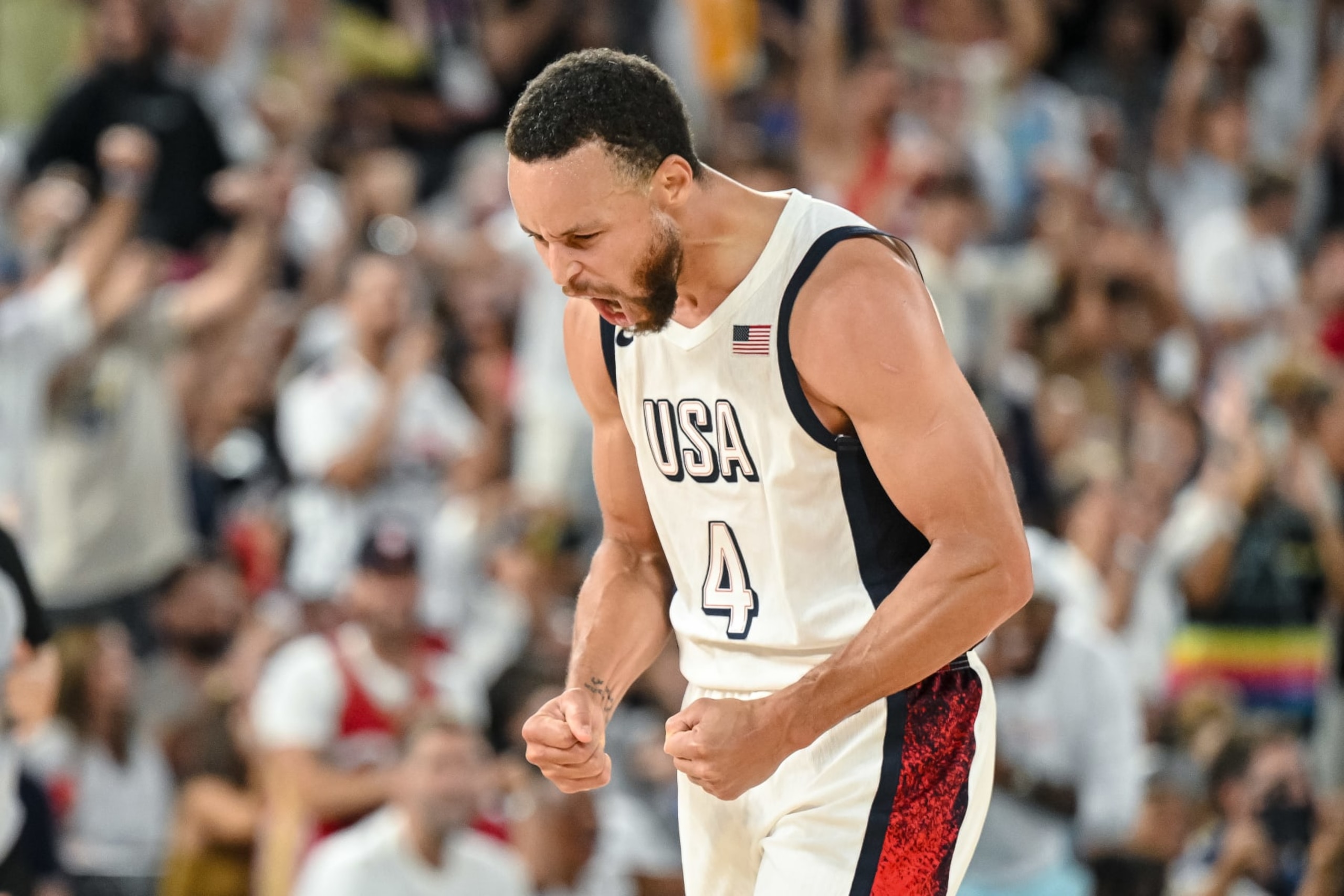 Stephen Curry of USA gestures, cheer during the Men's Basketball semi-final match between USA and Serbia on Day 13 of the Olympic Games Paris 2024 at Bercy Arena on August 8, 2024 in Paris, France. (Photo by Harry Langer/DeFodi Images via Getty Images) Stephen Curry of USA gestures, cheer during the Men's Basketball semi-final match between USA and Serbia on Day 13 of the Olympic Games Paris 2024 at Bercy Arena on August 8, 2024 in Paris, France. (Photo by Harry Langer/DeFodi Images via Getty Images)