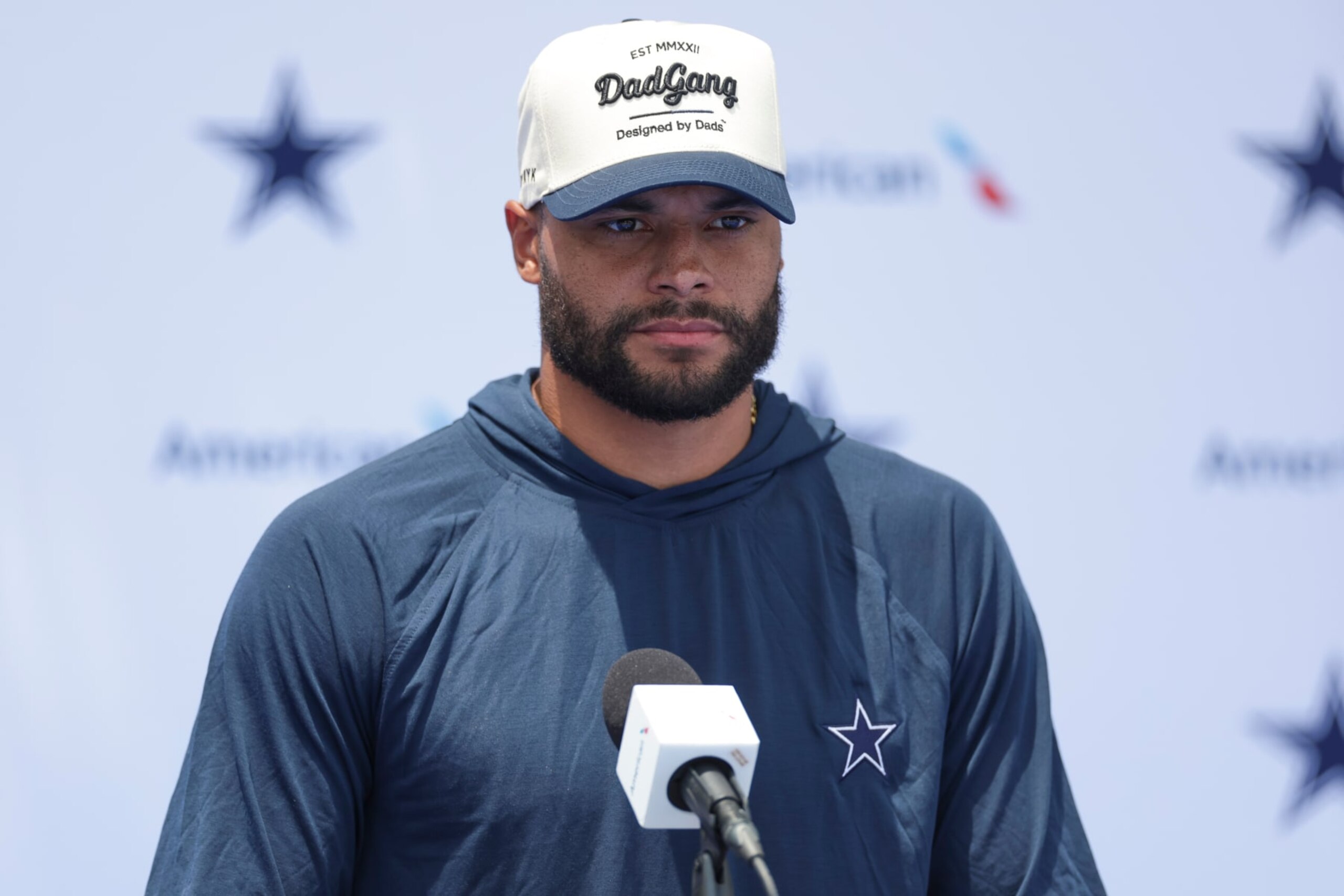 OXNARD, CA - JULY 25: Dallas Cowboys quarterback Dak Prescott (4) speaks with reporters during the team's training camp at River Ridge Playing Fields on July 25, 2024 in Oxnard, CA. (Photo by Brandon Sloter/Icon Sportswire via Getty Images)