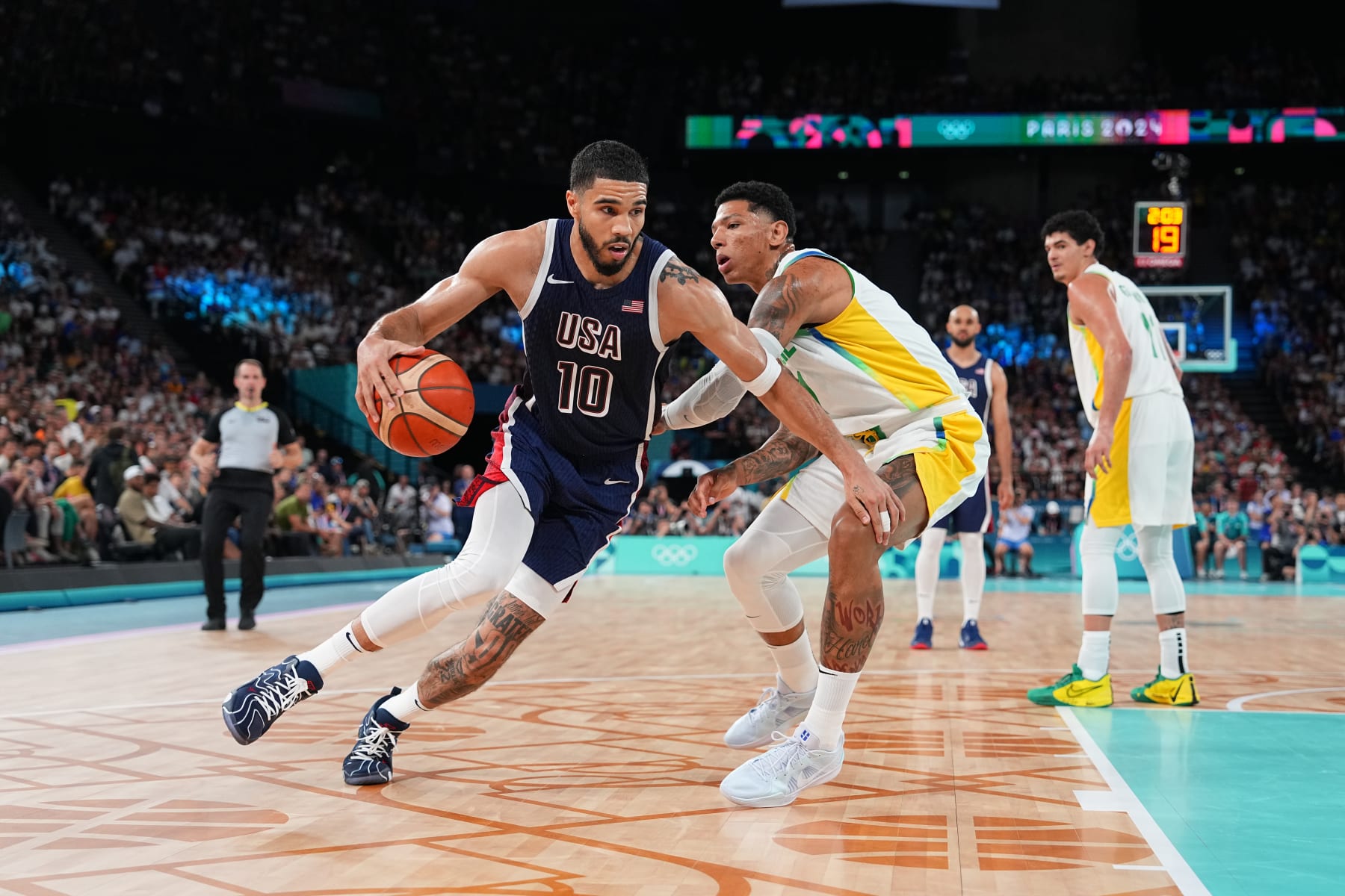 PARIS, FRANCE - AUGUST 6: Jayson Tatum #10 of Team USA drives to the basket during the game against Team Brazil on August 6, 2024 at the AccorHotels Arena in Paris, France. NOTE TO USER: User expressly acknowledges and agrees that, by downloading and/or using this photograph, user is consenting to the terms and conditions of the Getty Images License Agreement. Mandatory Copyright Notice: Copyright 2024 NBAE (Photo by Garrett Ellwood/NBAE via Getty Images)