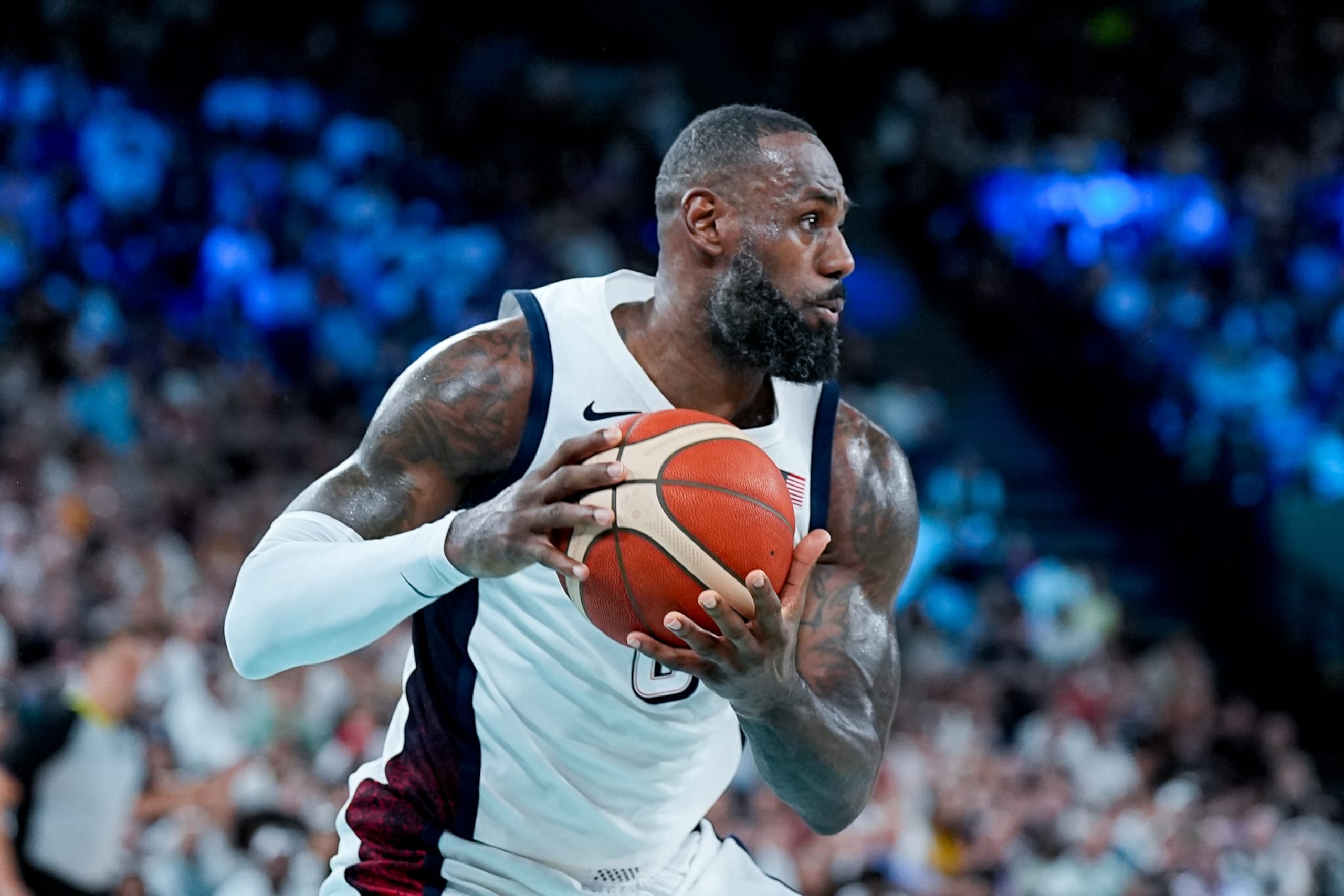PARIS, FRANCE - AUGUST 8: LeBron James of United States handles the ball during the Men's Semifinal Game between United States and Serbia on day thirteen of the Olympic Games Paris 2024 at Arena Bercy on August 8, 2024 in Paris, France. (Photo by Daniela Porcelli/Eurasia Sport Images/Getty Images)