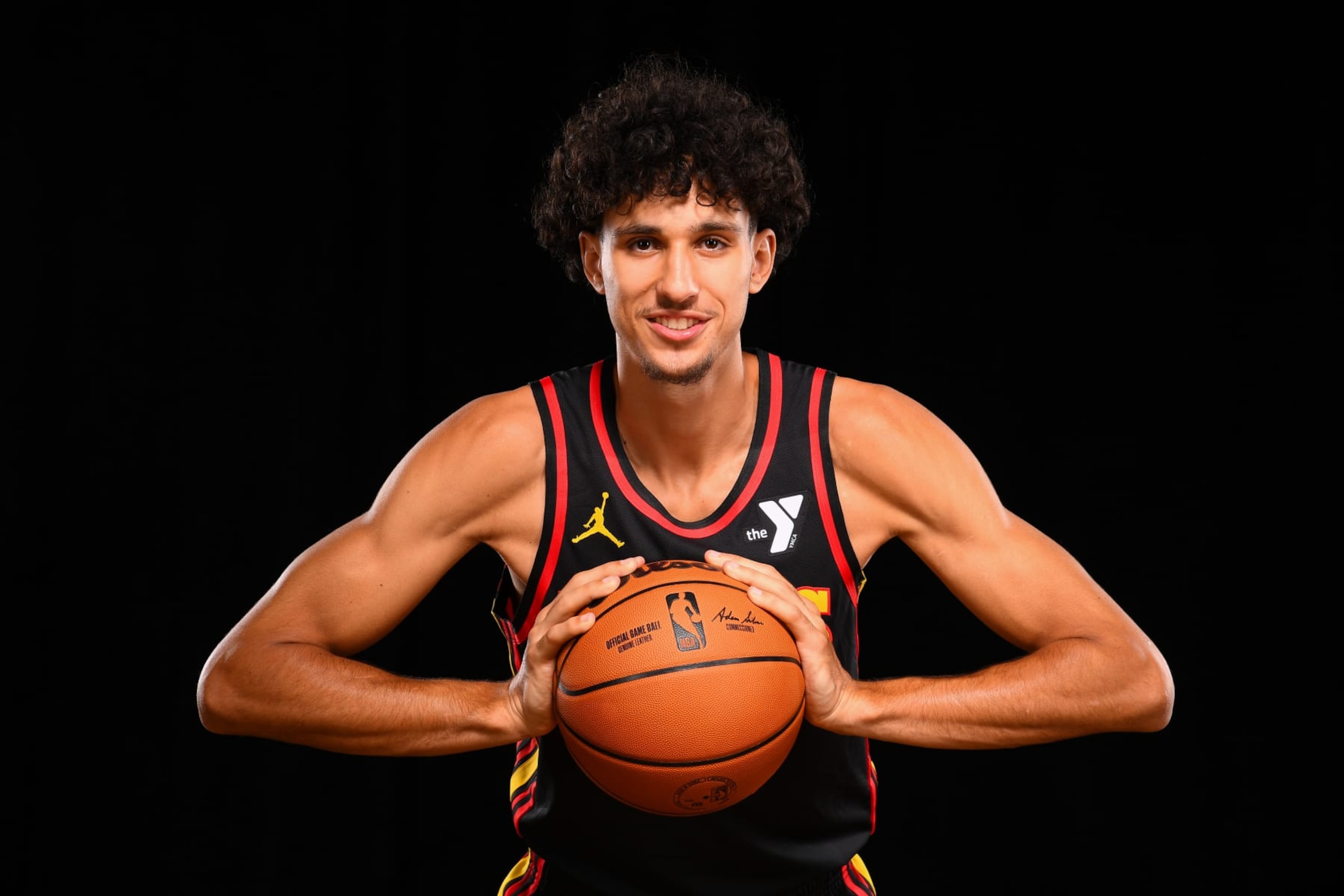LAS VEGAS, NV - JULY 16: Zaccharie Risacher #10 of the Atlanta Hawks poses for a portrait during the 2024 NBA Rookie Photo Shoot on July 16, 2024 at the University of Nevada, Las Vegas campus in Las Vegas, Nevada. NOTE TO USER: User expressly acknowledges and agrees that, by downloading and/or using this Photograph, user is consenting to the terms and conditions of the Getty Images License Agreement. Mandatory Copyright Notice: Copyright 2024 NBAE (Photo by Brian Babineau/NBAE via Getty Images)