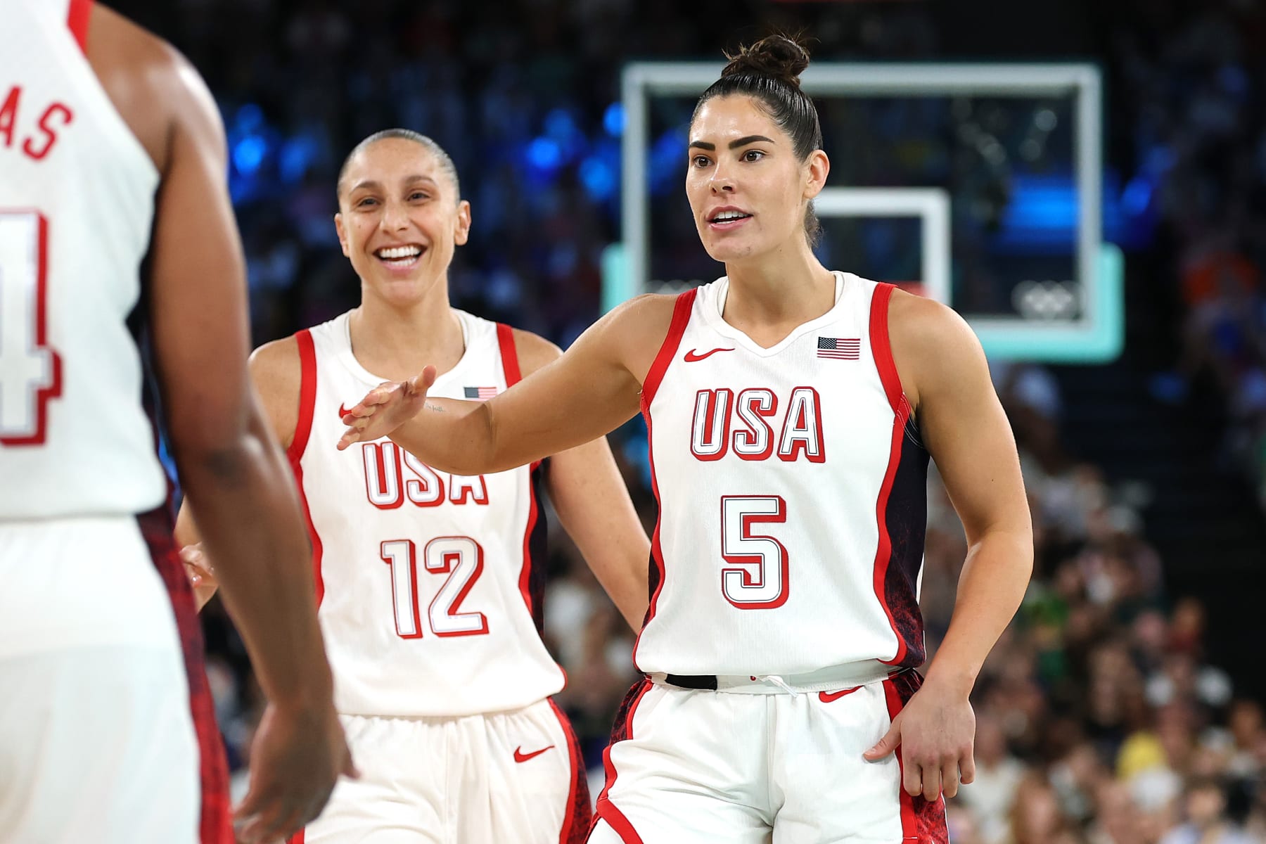 PARIS, FRANCE - AUGUST 09: Diana Taurasi #12 and Kelsey Plum #5 of Team United States react during a Women's semifinal match between Team United States and Team Australia on day fourteen of the Olympic Games Paris 2024 at Bercy Arena on August 09, 2024 in Paris, France. (Photo by Gregory Shamus/Getty Images)