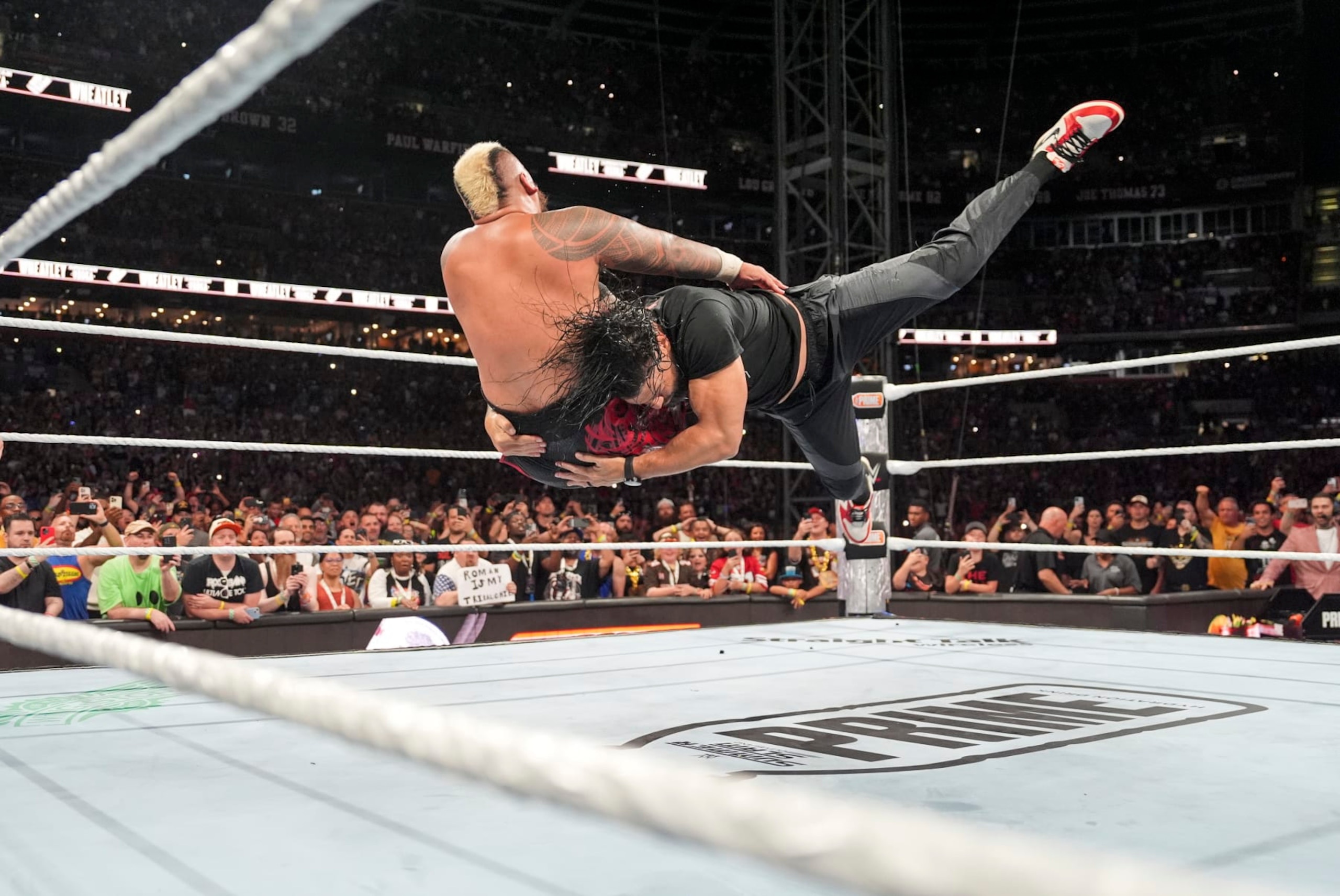 CLEVELAND, OHIO - AUGUST 03: Roman Reigns spears Solo Sikoa during SummerSlam at Cleveland Browns Stadium on August 3, 2024 in Cleveland, Ohio. (Photo by WWE/Getty Images) CLEVELAND, OHIO - AUGUST 03: Roman Reigns spears Solo Sikoa during SummerSlam at Cleveland Browns Stadium on August 3, 2024 in Cleveland, Ohio. (Photo by WWE/Getty Images)