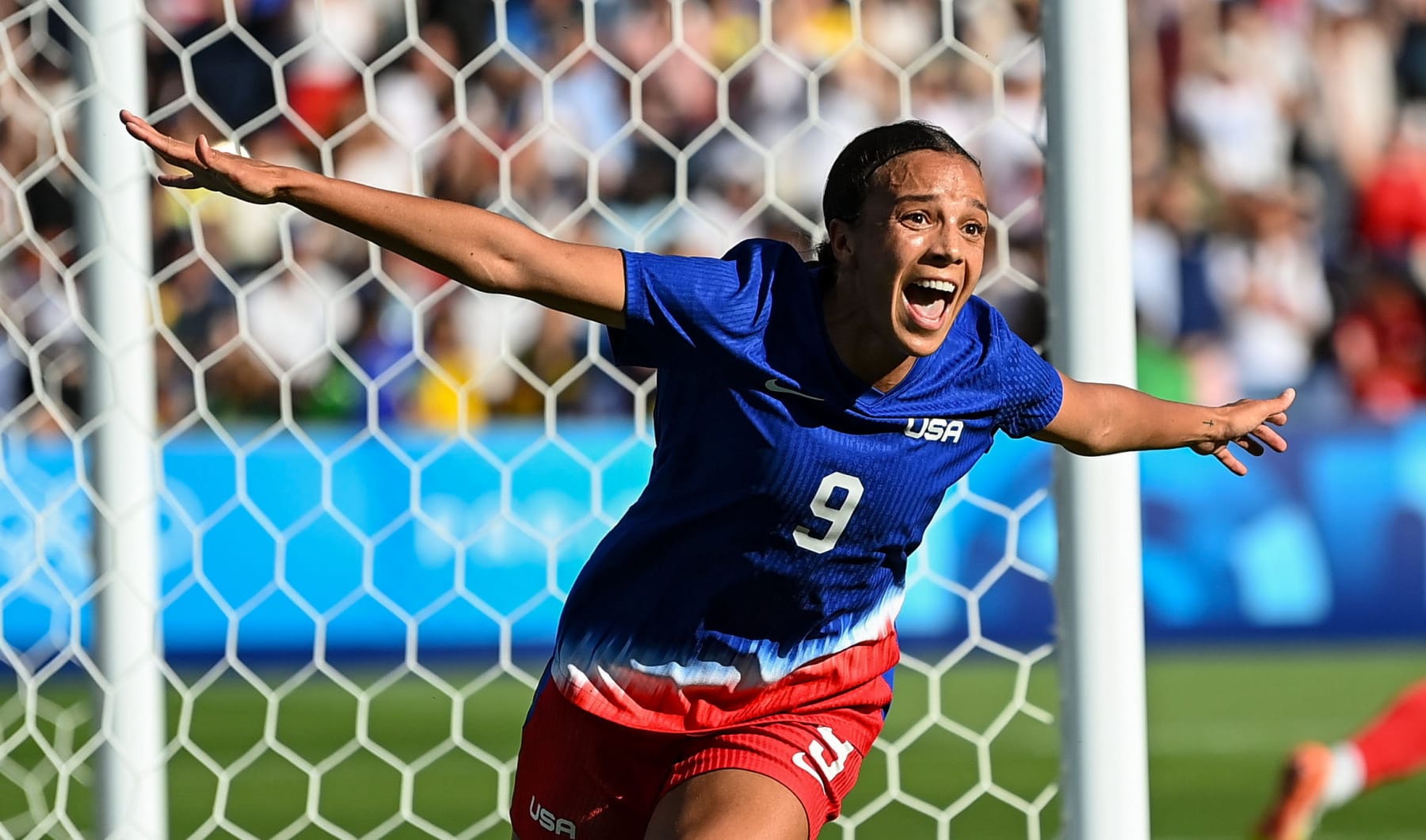 Paris , France - 10 August 2024; Mallory Swanson of Team United States celebrates after scoring her side's first goal during the women's gold medal match between Team Brazil and Team United States at Parc des Princes during the 2024 Paris Summer Olympic Games in Paris, France. (Photo By Stephen McCarthy/Sportsfile via Getty Images)