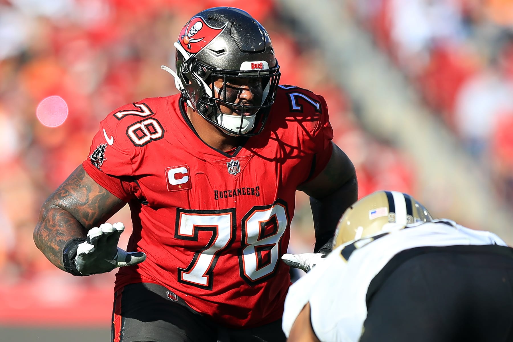TAMPA, FL - DECEMBER 31: Tampa Bay Buccaneers Offensive Tackle Tristan Wirfs (78) pass blocks during the regular season game between the New Orleans Saints and the Tampa Bay Buccaneers on December 31, 2023 at Raymond James Stadium in Tampa, Florida. (Photo by Cliff Welch/Icon Sportswire via Getty Images)