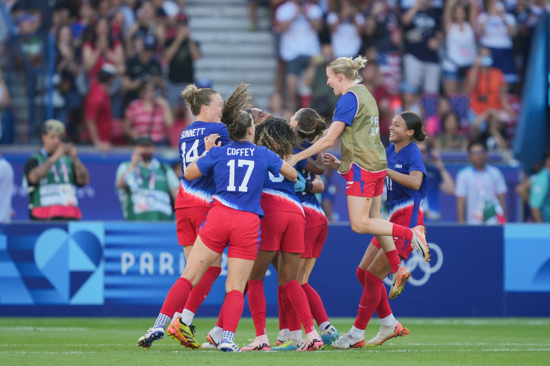 PARIS, FRANCE - AUGUST 10: The United States women's soccer team celebrate defeating Brazil after the Women's Gold Medal match during the Olympic Games Paris 2024 at Parc des Princes on August 10, 2024 in Paris, France. (Photo by John Todd/ISI/Getty Images)
