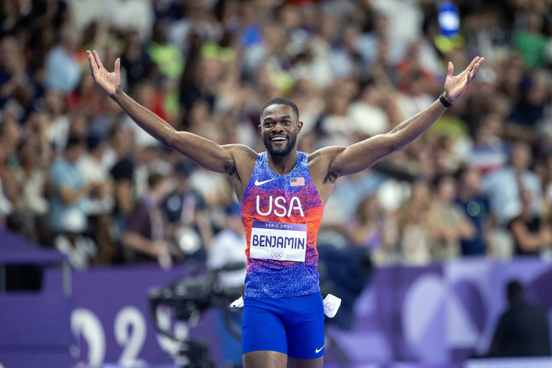 PARIS, FRANCE: AUGUST 09:  Rai Benjamin of the United States celebrates his gold medal victory in the  Men's 400m Hurdles Final during the Athletics Competition at the Stade de France during the Paris 2024 Summer Olympic Games on August 9th, 2024, in Paris, France. (Photo by Tim Clayton/Corbis via Getty Images)
