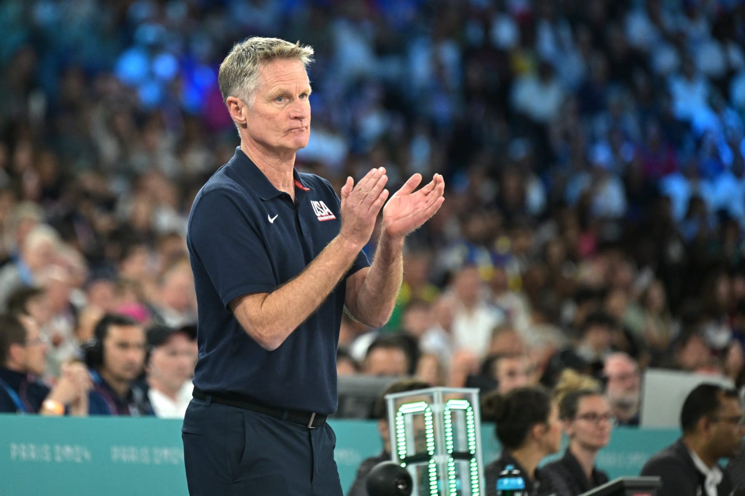 USA's coach Steve Kerr applauds in the men's Gold Medal basketball match between France and USA during the Paris 2024 Olympic Games at the Bercy  Arena in Paris on August 10, 2024. (Photo by Damien MEYER / AFP) (Photo by DAMIEN MEYER/AFP via Getty Images)