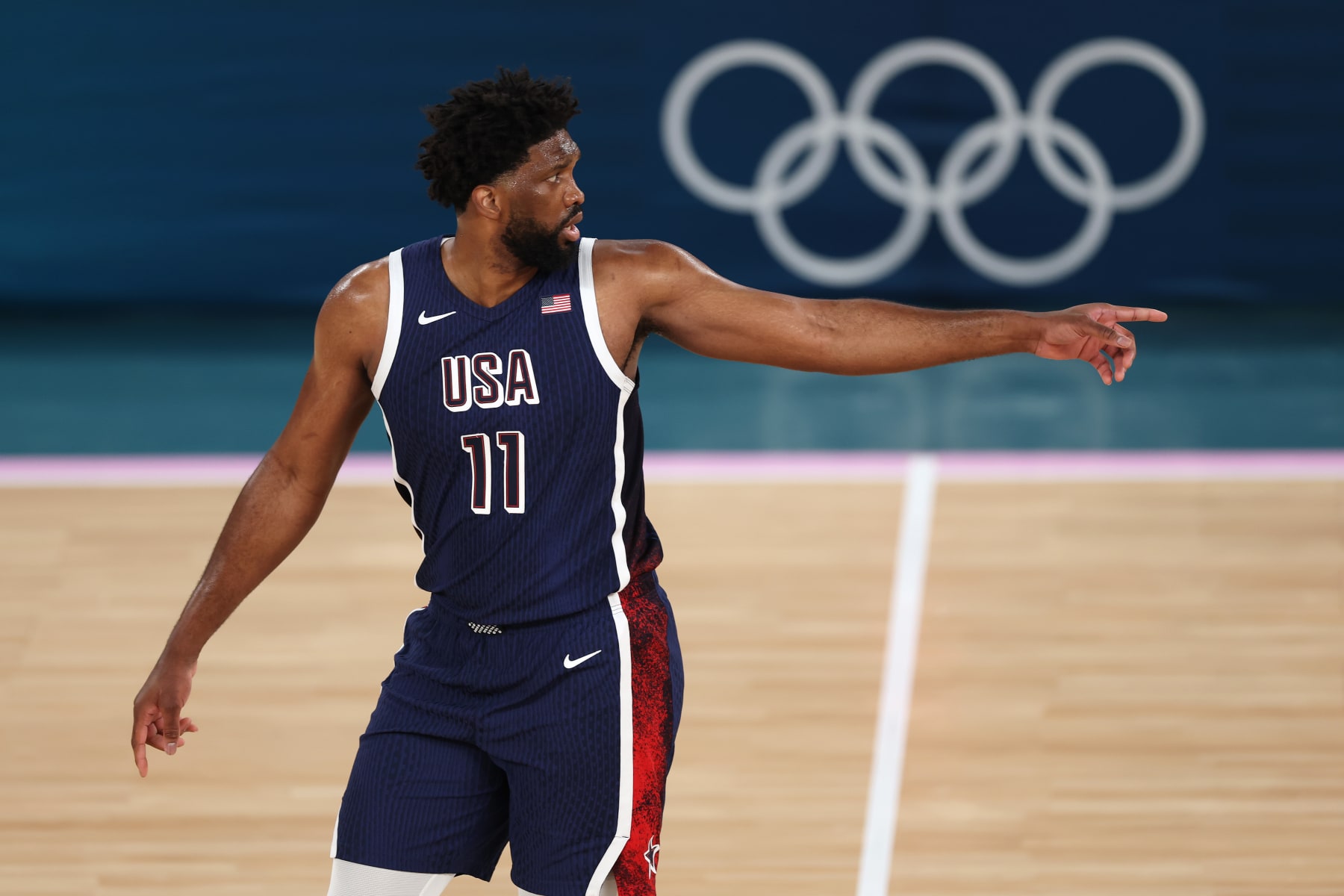 PARIS, FRANCE - AUGUST 10: Joel Embiid #11 of Team United States looks on during the Men's Gold Medal game between Team France and Team United States on day fifteen of the Olympic Games Paris 2024 at Bercy Arena on August 10, 2024 in Paris, France. (Photo by Jamie Squire/Getty Images)