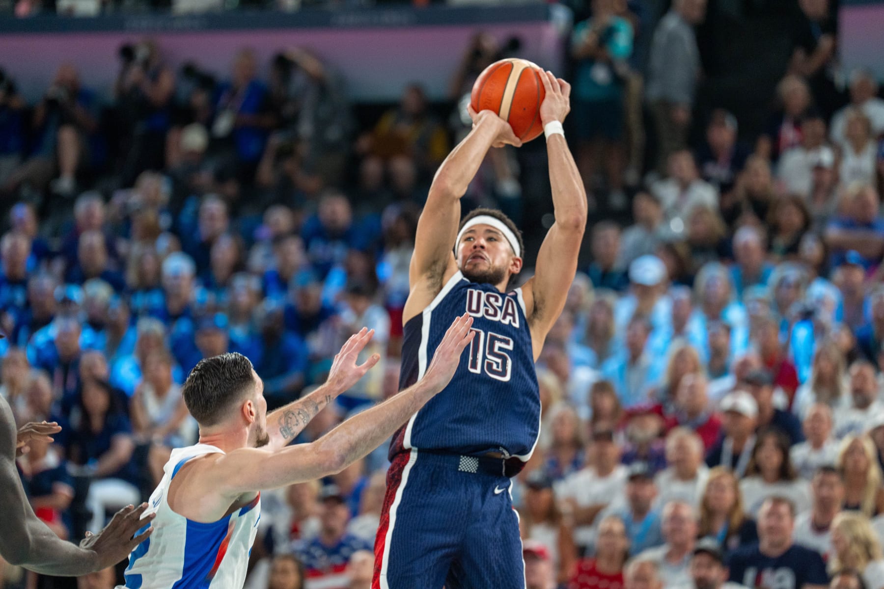 PARIS, FRANCE - AUGUST 10: Devin Booker (15) of Team USA in action during Men's Gold Medal game between Team France and Team United States on day fifteen of the Olympic Games Paris 2024 at Bercy Arena on August 10, 2024 in Paris, France. (Photo by Aytac Unal/Anadolu via Getty Images)