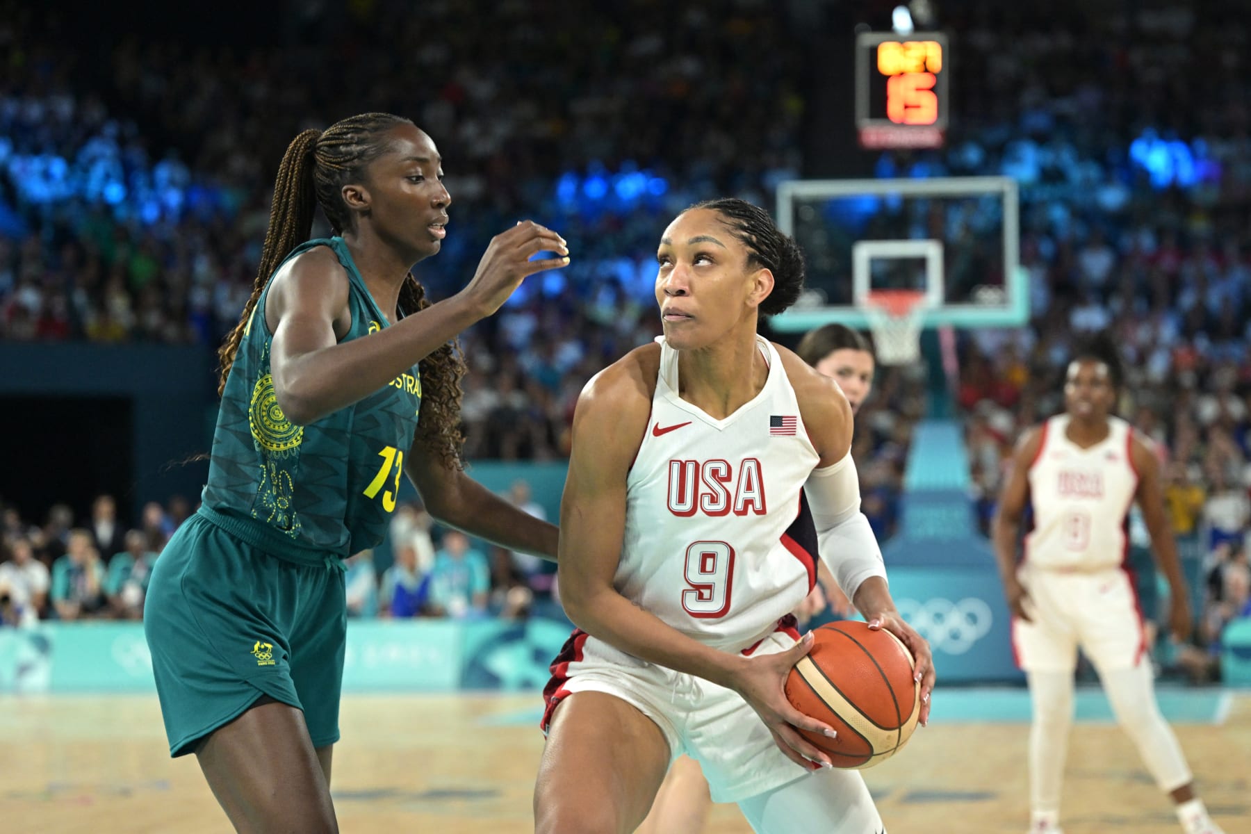 USA's #09 A'ja Wilson challenges Australia's #13 Ezi Magbegor in the women's semifinal basketball match between USA and Australia during the Paris 2024 Olympic Games at the Bercy Arena in Paris on August 9, 2024. (Photo by Damien MEYER / AFP) (Photo by DAMIEN MEYER/AFP via Getty Images)