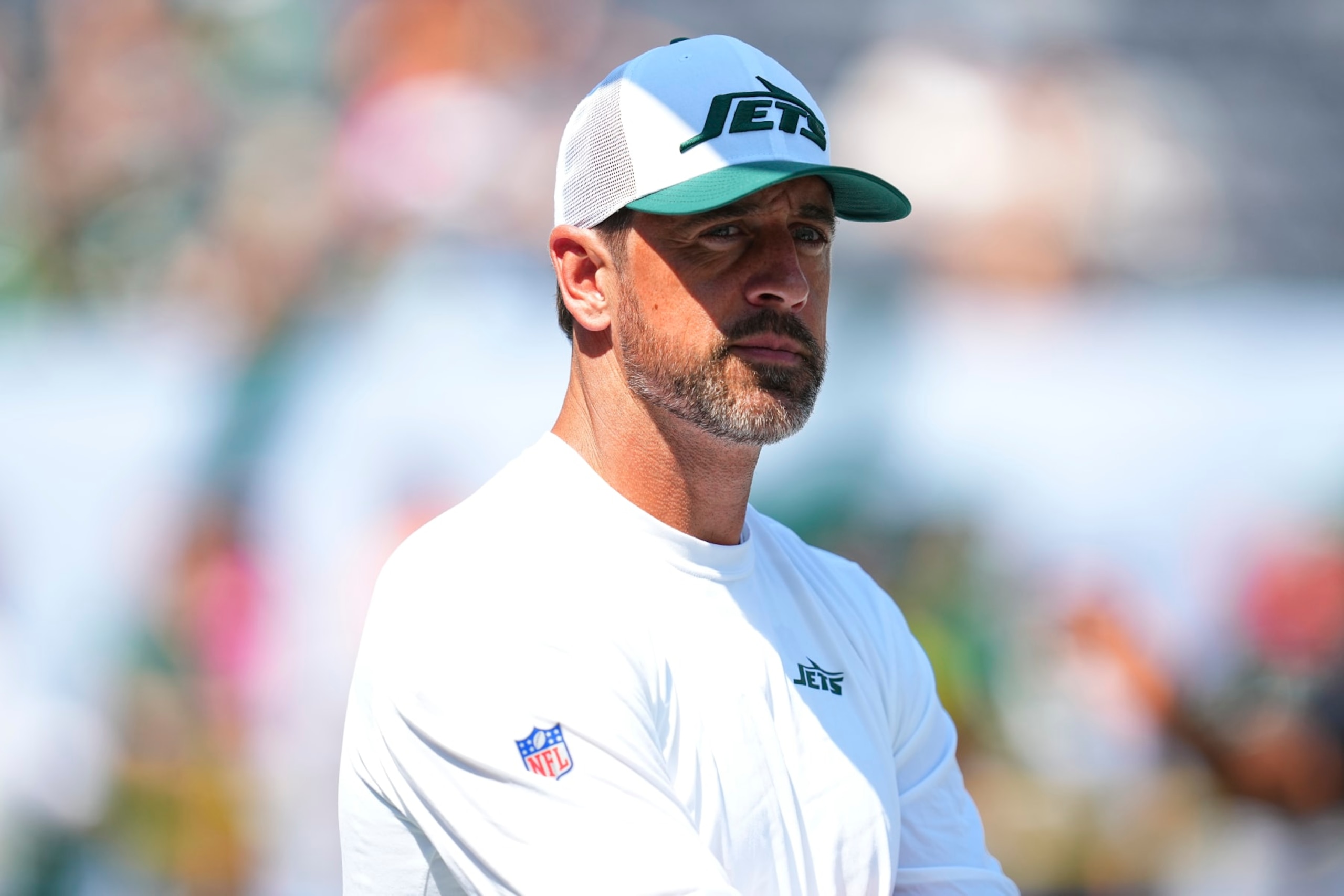 EAST RUTHERFORD, NEW JERSEY - AUGUST 10: Aaron Rodgers #8 of the New York Jets looks on prior to the preseason game against the Washington Commanders at MetLife Stadium on August 10, 2024 in East Rutherford, New Jersey. (Photo by Mitchell Leff/Getty Images)