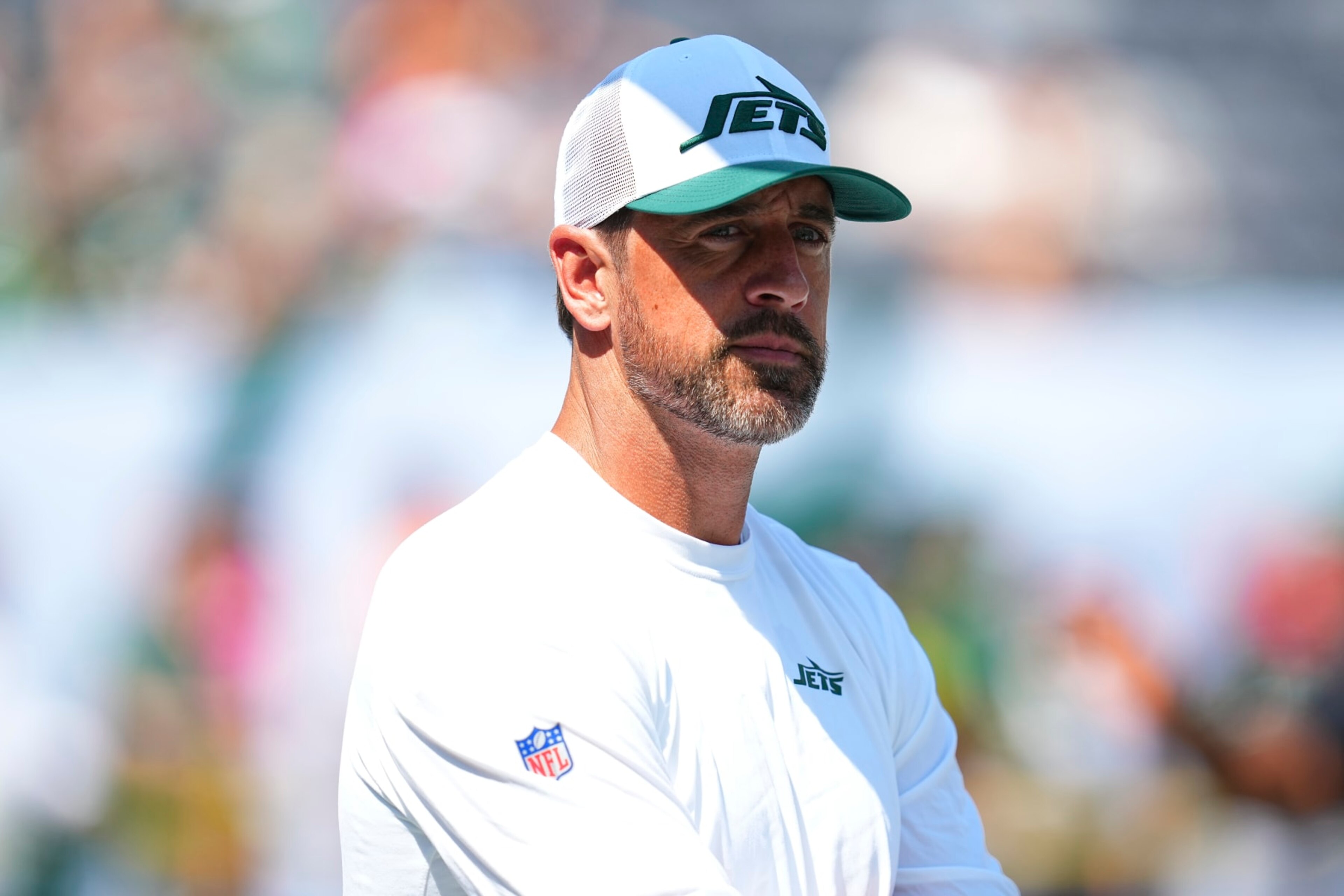 EAST RUTHERFORD, NEW JERSEY - AUGUST 10: Aaron Rodgers #8 of the New York Jets looks on prior to the preseason game against the Washington Commanders at MetLife Stadium on August 10, 2024 in East Rutherford, New Jersey. (Photo by Mitchell Leff/Getty Images)
