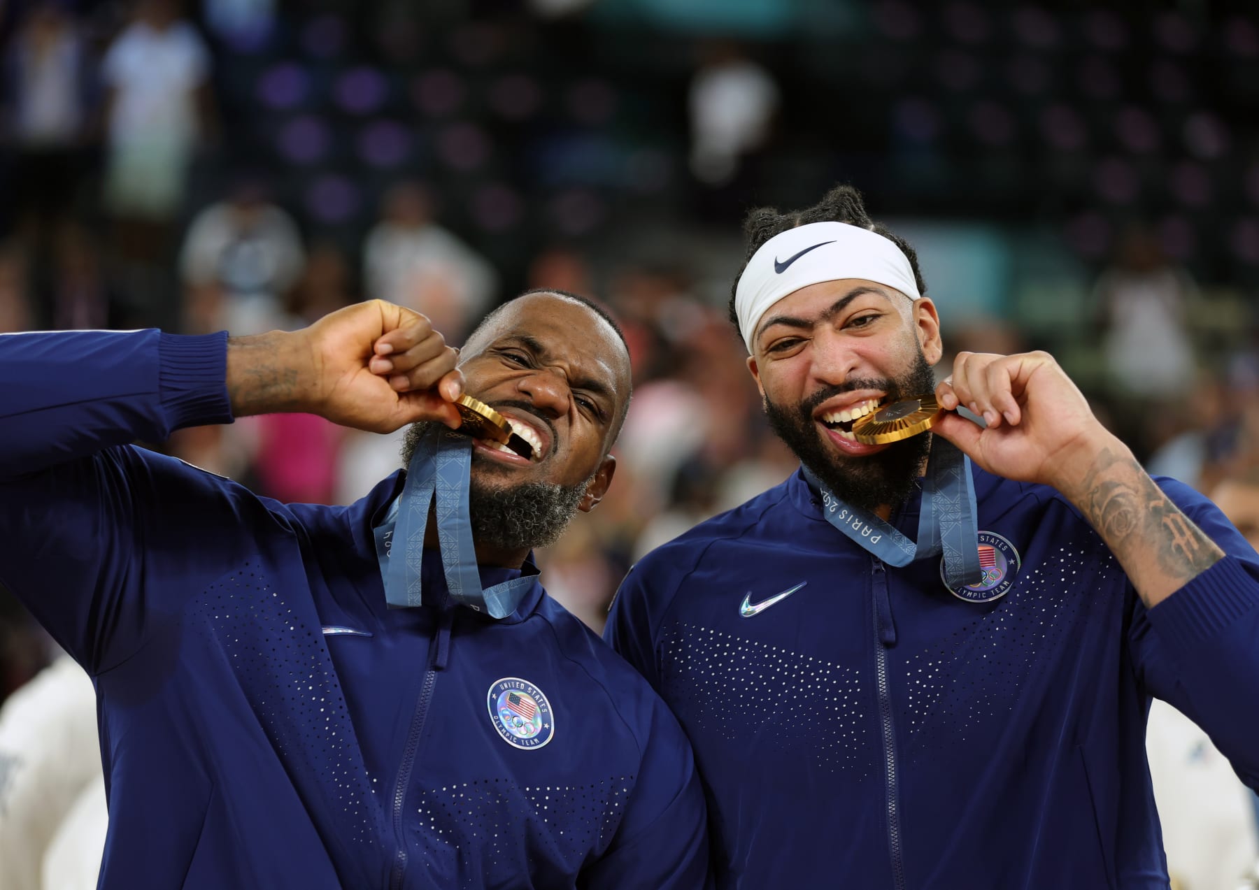 PARIS, FRANCE - AUGUST 10:  Gold medalists LeBron James of United States and Anthony Davis of United States pose for a photo  after winning during the match between the USA and France during the Men's Gold Medal Game on day fifteen of the Olympic Games Paris 2024 at Bercy Arena on August 10, 2024 in Paris, France. (Photo by Christina Pahnke - sampics/Getty Images)