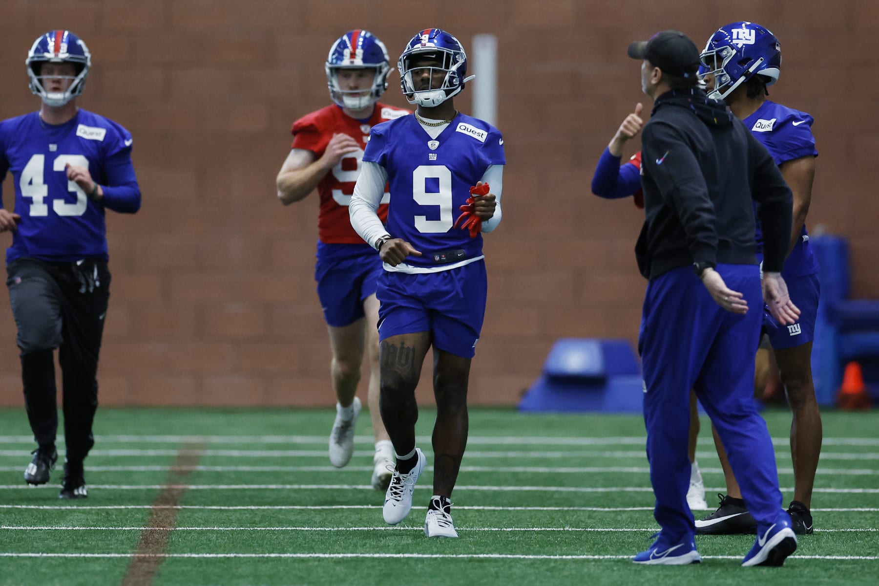 EAST RUTHERFORD, NEW JERSEY - MAY 10: Wide receiver Malik Nabers #9 of the New York Yankees runs drills during New York Giants Rookie Minicamp at Quest Diagnostics Training Center on May 10, 2024 in East Rutherford, New Jersey. (Photo by Sarah Stier/Getty Images)