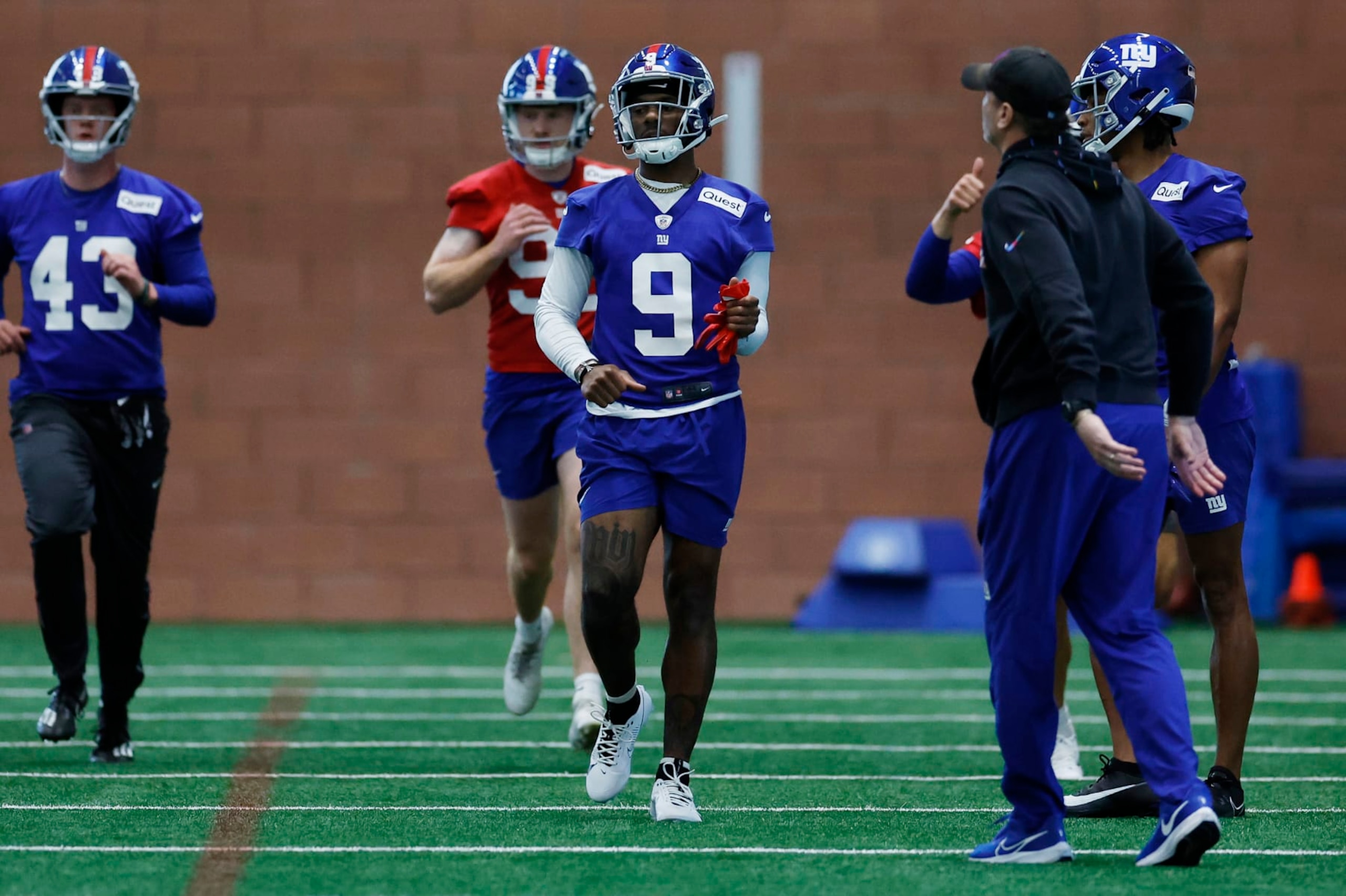 EAST RUTHERFORD, NEW JERSEY - MAY 10: Wide receiver Malik Nabers #9 of the New York Yankees runs drills during New York Giants Rookie Minicamp at Quest Diagnostics Training Center on May 10, 2024 in East Rutherford, New Jersey. (Photo by Sarah Stier/Getty Images)