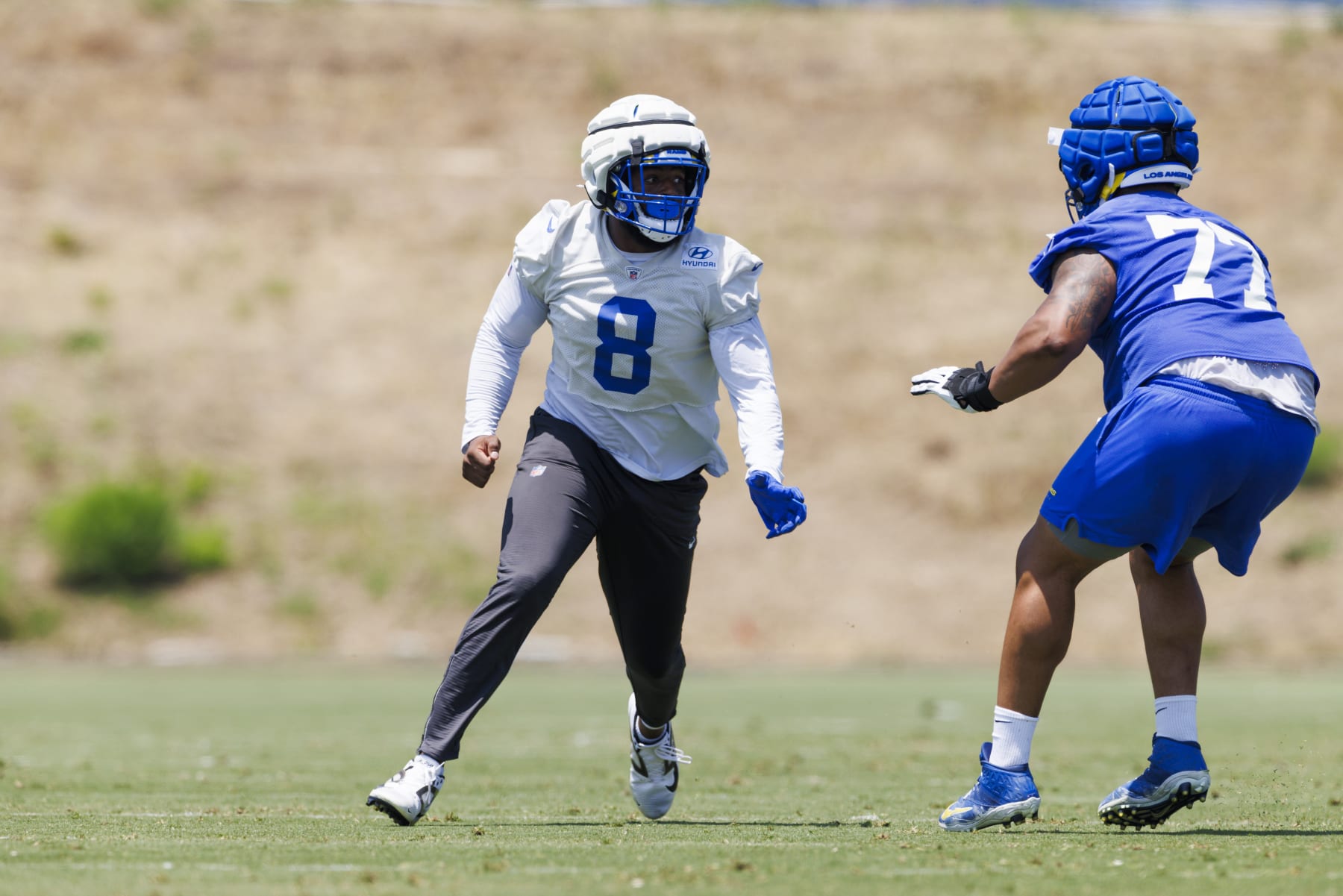 THOUSAND OAKS, CALIFORNIA - JUNE 4: Jared Verse #8 of the Los Angeles Rams rushes the edge during an NFL football organized team activity on June 4, 2024 in Thousand Oaks, California. (Photo by Ric Tapia/Getty Images)