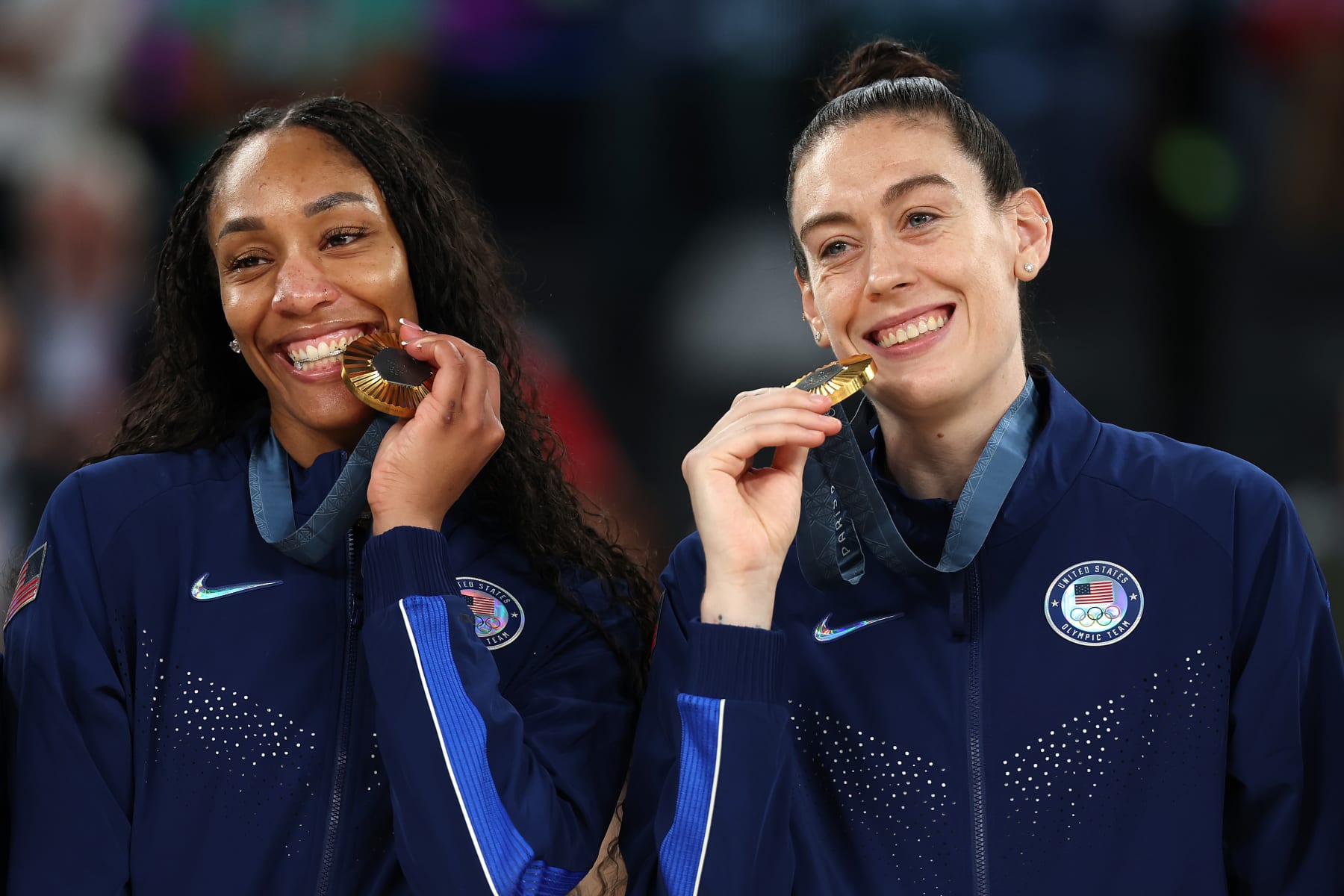 PARIS, FRANCE - AUGUST 11: Gold medalists A'Ja Wilson #9 and Breanna Stewart #10 of Team United States poses for a photo while on the podium during the Women's basketball medal ceremony on day sixteen of the Olympic Games Paris 2024 at Bercy Arena on August 11, 2024 in Paris, France. (Photo by Gregory Shamus/Getty Images)