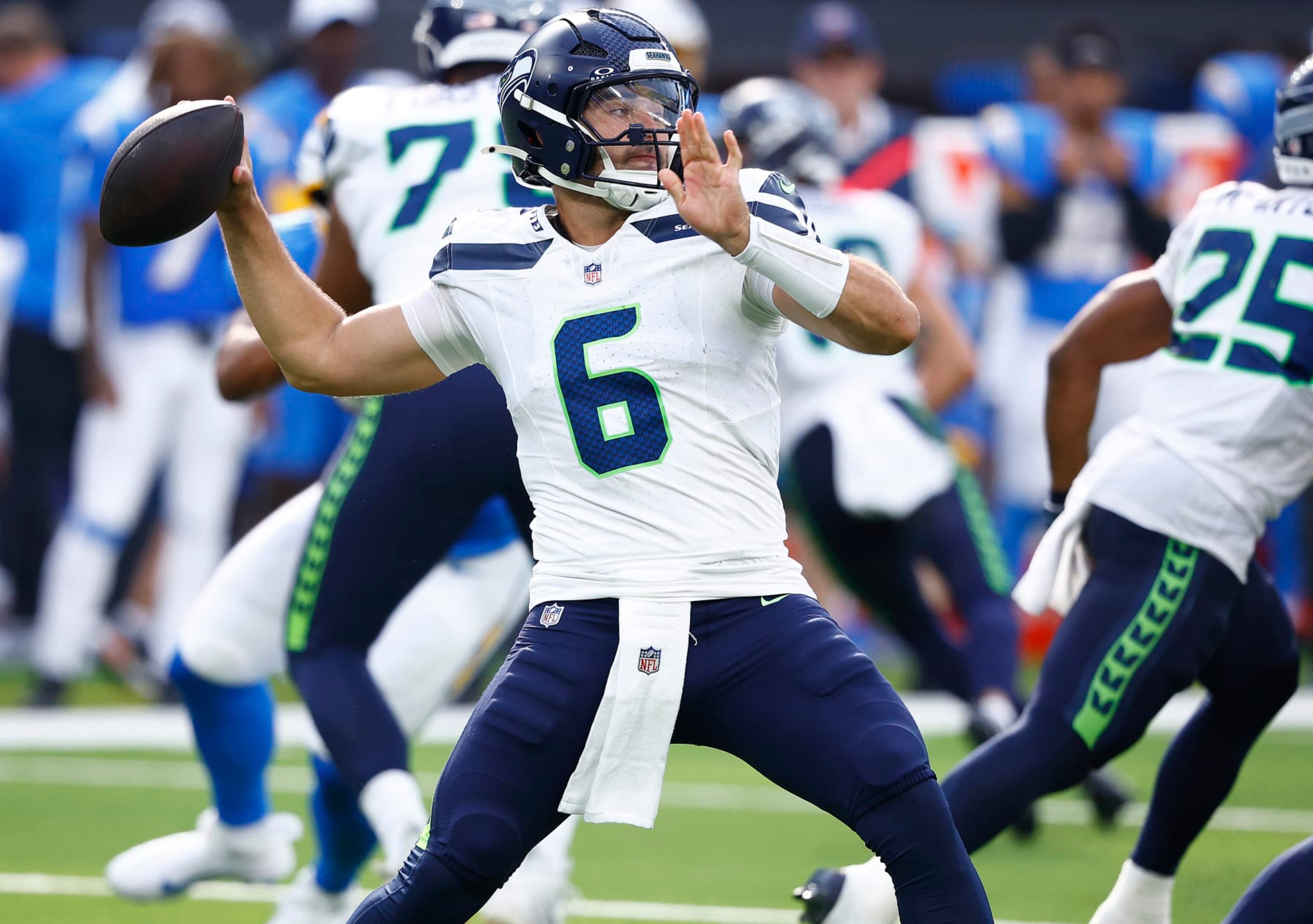 INGLEWOOD, CALIFORNIA - AUGUST 10:  Sam Howell #6 of the Seattle Seahawks throws against the Los Angeles Chargers in the first half before a preseason game at SoFi Stadium on August 10, 2024 in Inglewood, California. (Photo by Ronald Martinez/Getty Images)