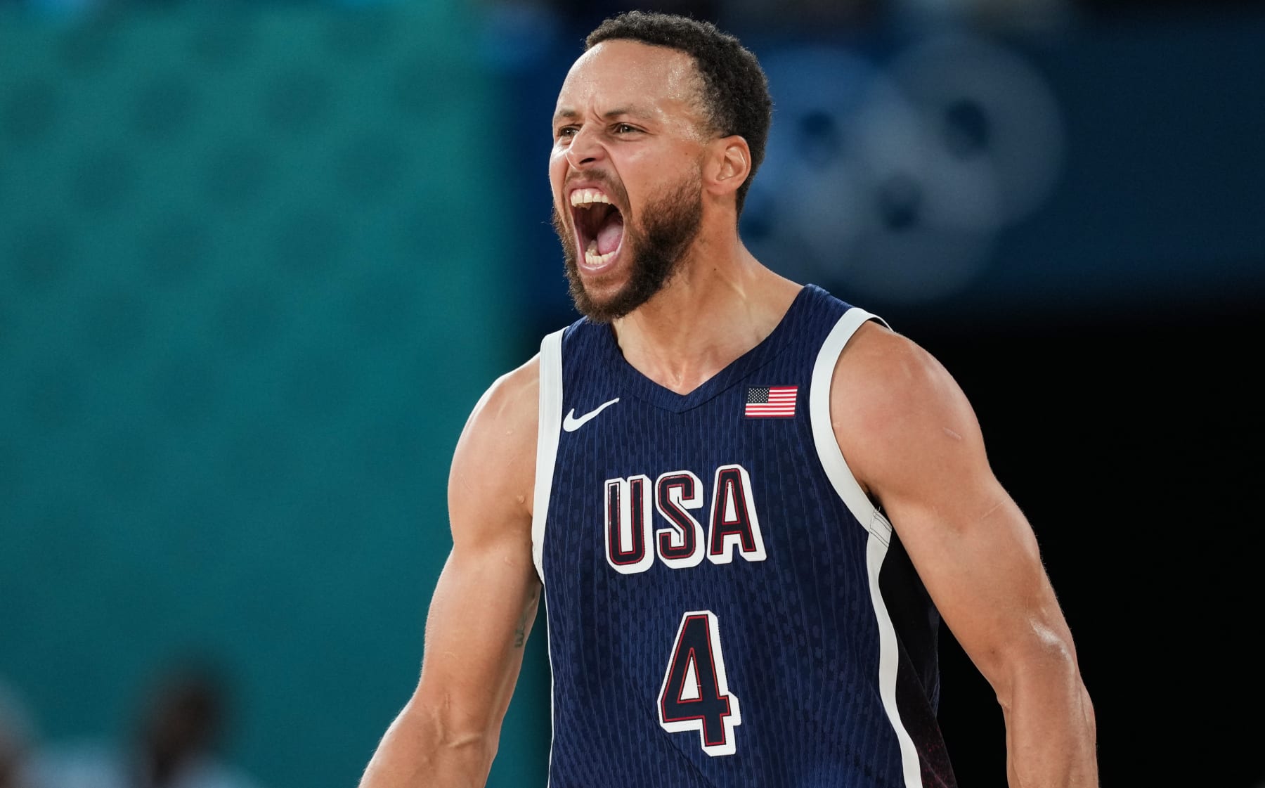 PARIS, FRANCE - AUGUST 10: Stephen Curry (4) of Team USA reacts during Men's Gold Medal game between Team France and Team United States on day fifteen of the Olympic Games Paris 2024 at Bercy Arena on August 10, 2024 in Paris, France. (Photo by Mustafa Ciftci/Anadolu via Getty Images)