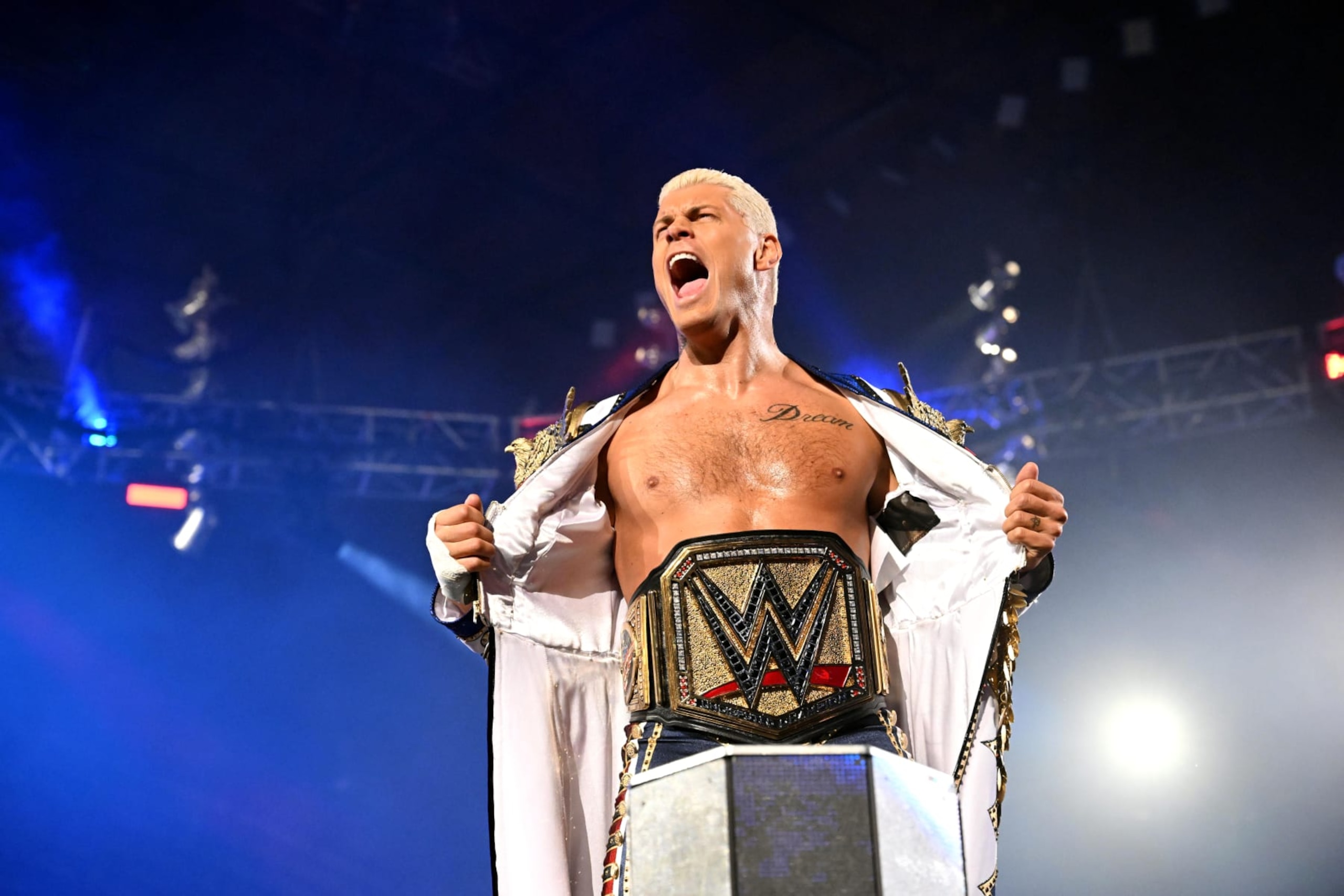 ROSEMONT, ILLINOIS - JUNE 21: WWE Undisputed Champion Cody Rhodes reacts as he makes his entrance during WWE SmackDown at Allstate Arena on June 21, 2024 in Rosemont, Illinois.  (Photo by WWE/Getty Images)