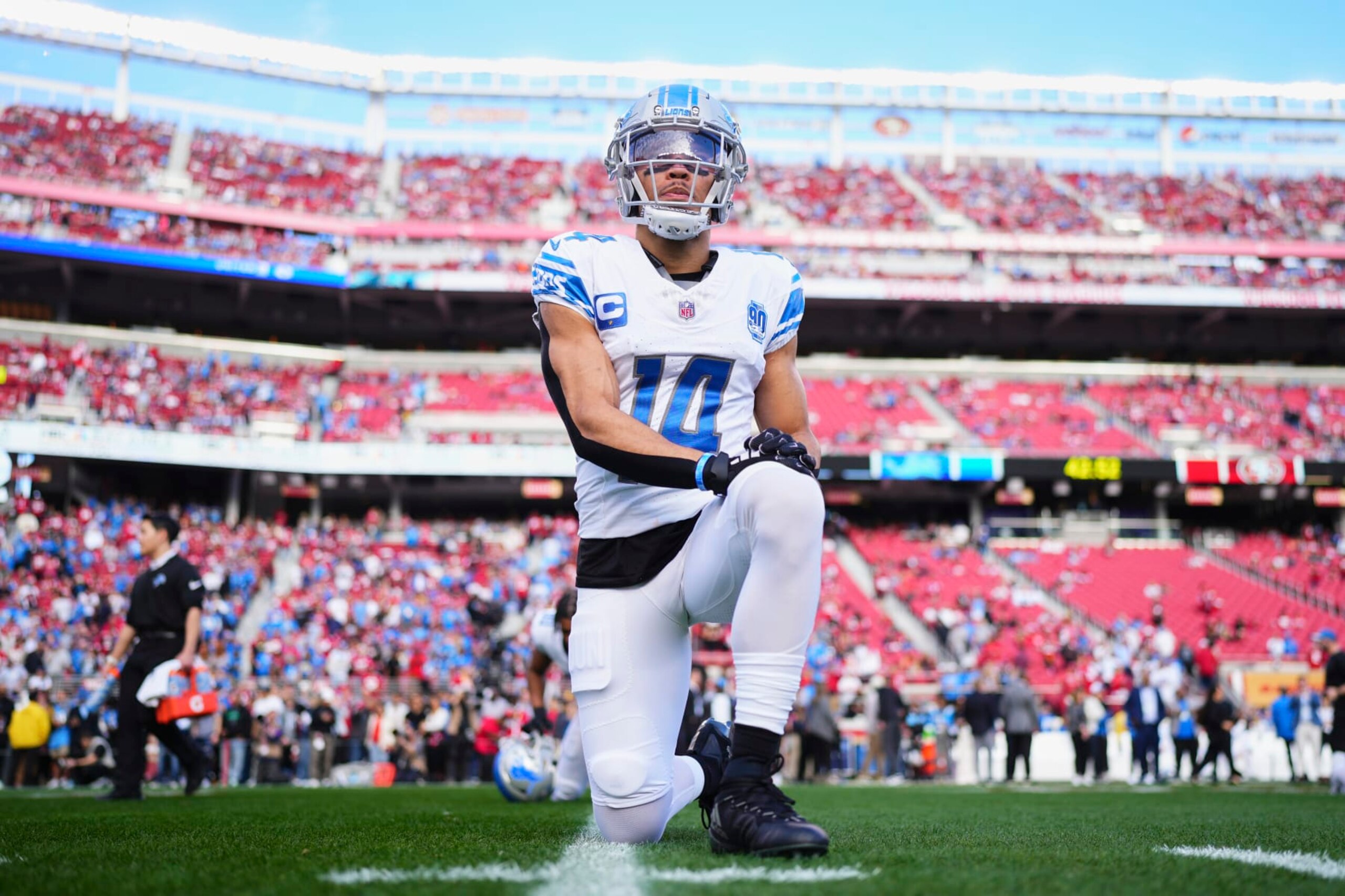 SANTA CLARA, CA - JANUARY 28: Amon-Ra St. Brown #14 of the Detroit Lions warms up before kickoff against the San Francisco 49ers during the NFC Championship football game at Levi's Stadium on January 28, 2024 in Santa Clara, California. (Photo by Cooper Neill/Getty Images)