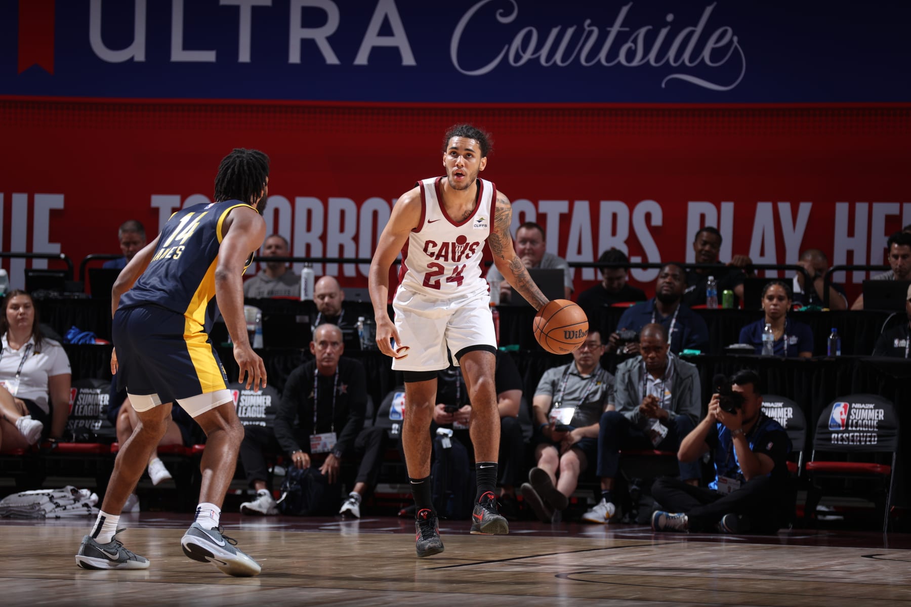 LAS VEGAS, NV - JULY 20: Jaylon Tyson #24 of the Cleveland Cavaliers handles the ball during the game against the Indiana Pacers on July 20, 2024 at the Thomas & Mack Center in Las Vegas, Nevada. NOTE TO USER: User expressly acknowledges and agrees that, by downloading and or using this photograph, User is consenting to the terms and conditions of the Getty Images License Agreement. Mandatory Copyright Notice: Copyright 2023 NBAE (Photo by Stephen Gosling/NBAE via Getty Images)