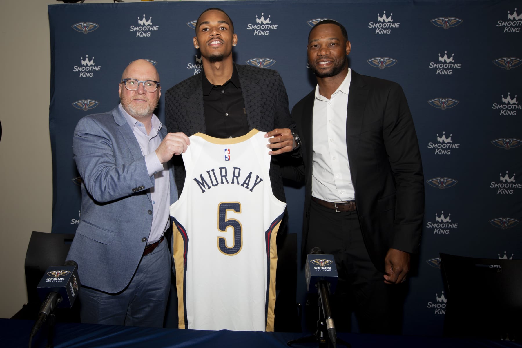 NEW ORLEANS, LA - July 9, 2024: Dejounte Murray #5 of the New Orleans Pelicans poses for pictures during the New Orleans Pelicans introductory press conference at Ochsner Sports Performance Center in Metairie, Louisiana. NOTE TO USER: User expressly acknowledges and agrees that, by downloading and or using this Photograph, user is consenting to the terms and conditions of the Getty Images License Agreement. Mandatory Copyright Notice: Copyright 2023 NBAE (Photo by Derick Hingle/NBAE via Getty Images)