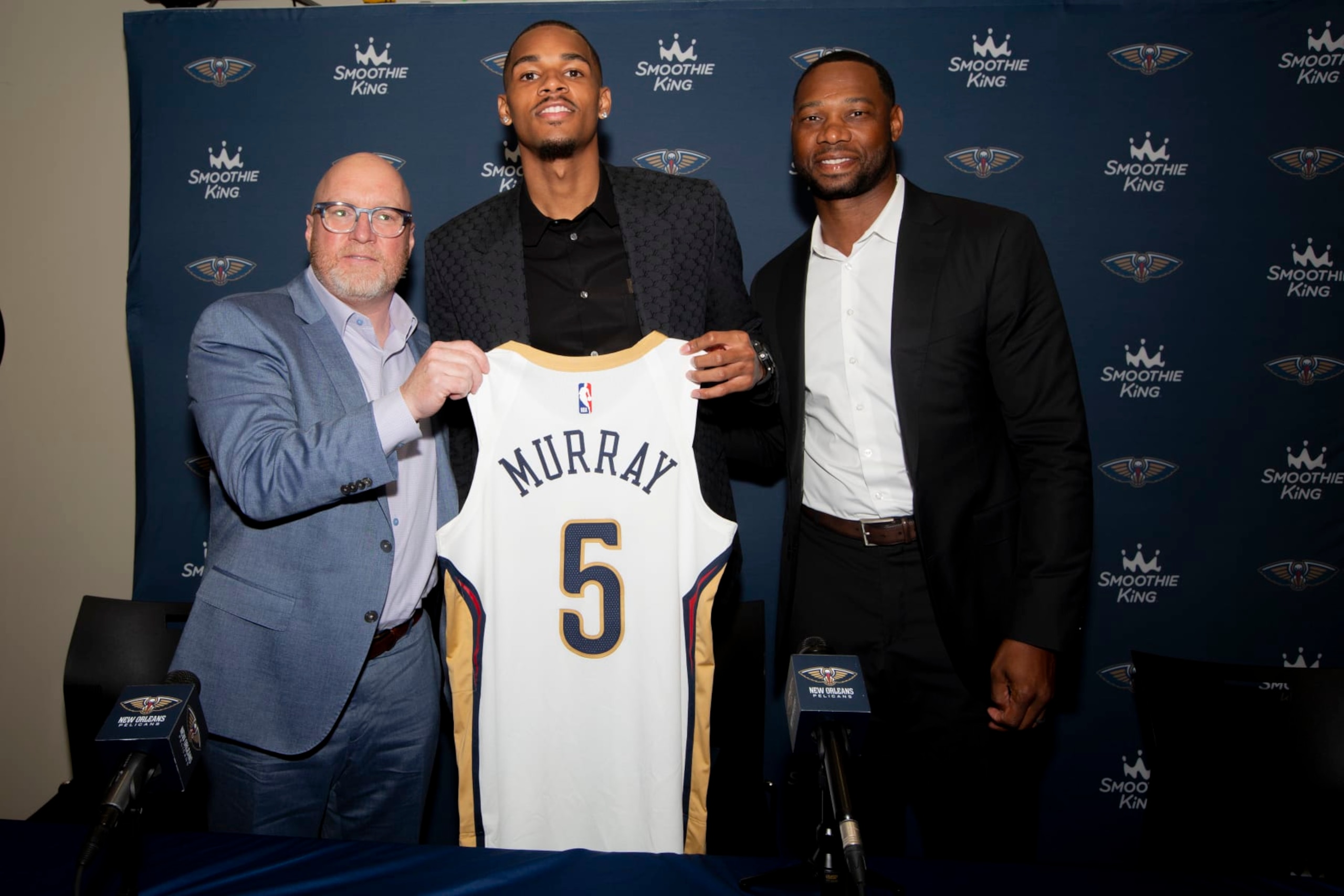NEW ORLEANS, LA - July 9, 2024: Dejounte Murray #5 of the New Orleans Pelicans poses for pictures during the New Orleans Pelicans introductory press conference at Ochsner Sports Performance Center in Metairie, Louisiana. NOTE TO USER: User expressly acknowledges and agrees that, by downloading and or using this Photograph, user is consenting to the terms and conditions of the Getty Images License Agreement. Mandatory Copyright Notice: Copyright 2023 NBAE (Photo by Derick Hingle/NBAE via Getty Images)
